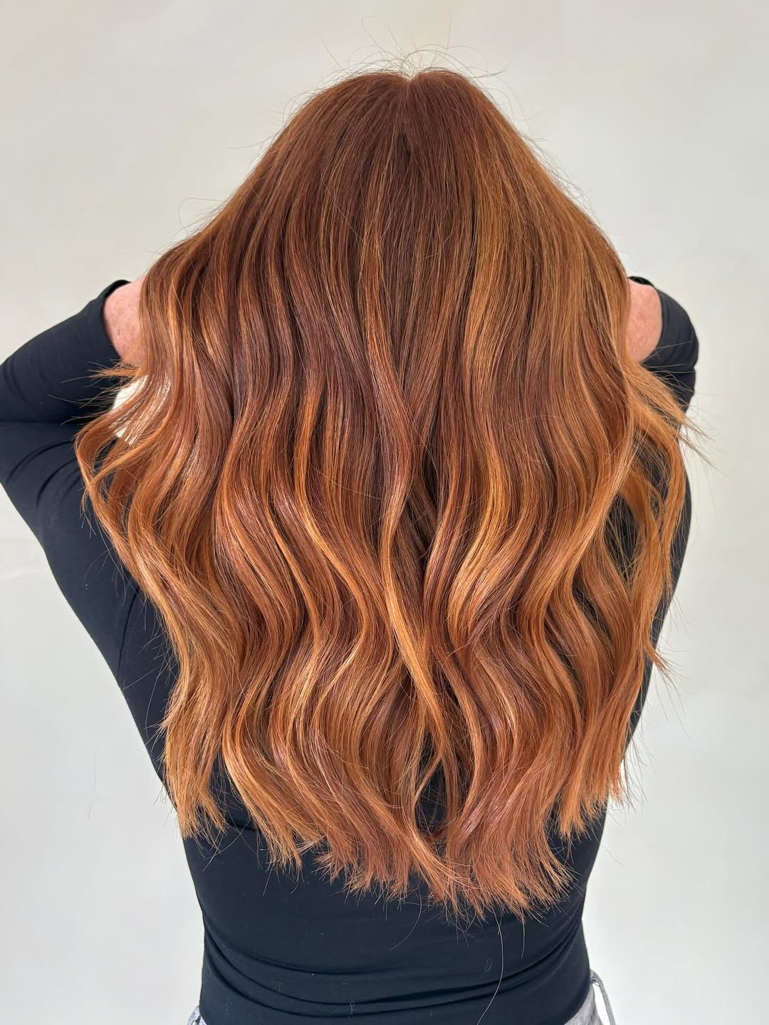 Copper Hair Summer Ideas 2026: Chic Sundress Look A woman with vibrant copper hair wearing a flowy white sundress, sunglasses, and a wide-brimmed straw hat, embodying perfect copper hair summer ideas 2026.