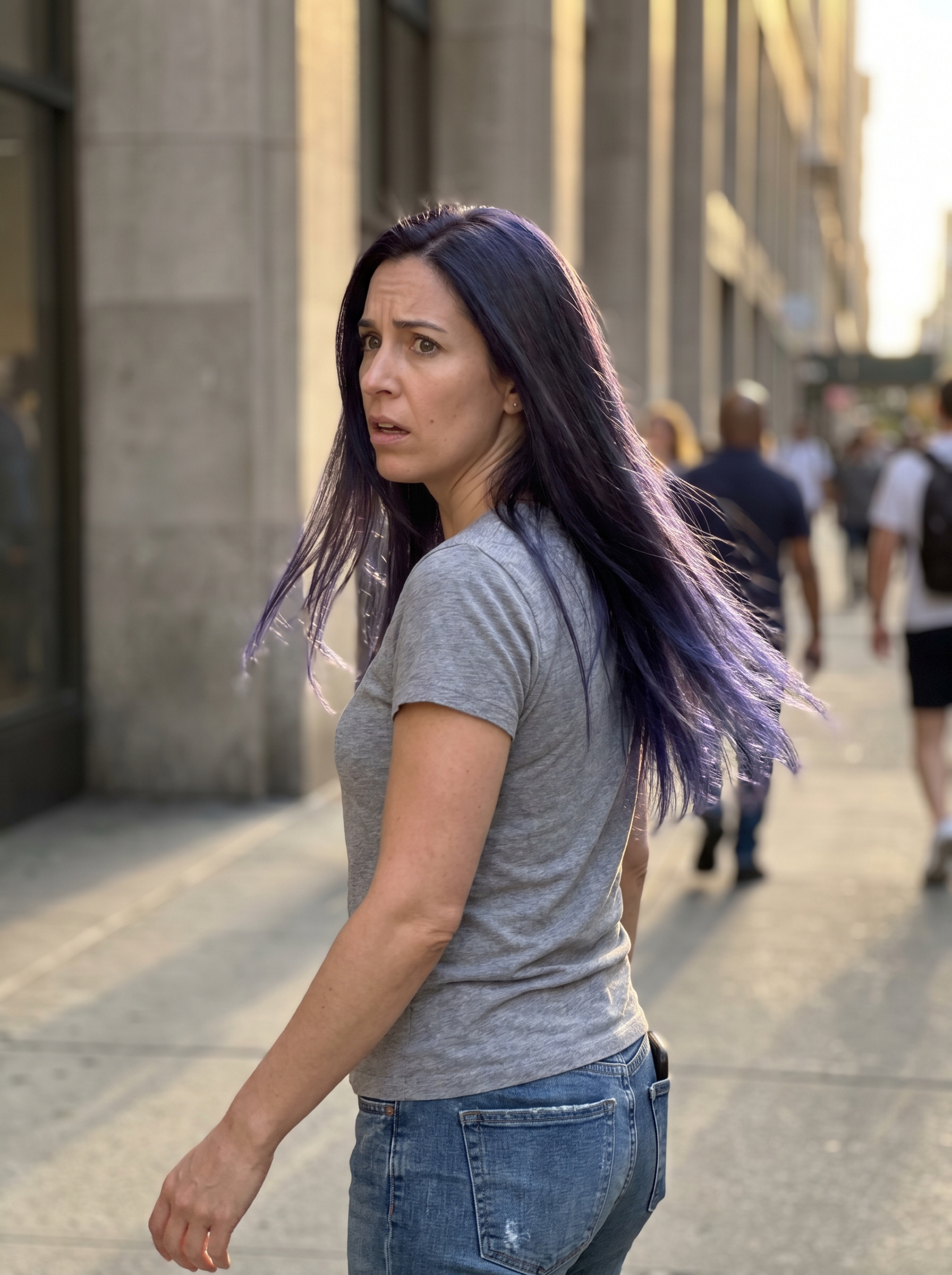 A close-up of dark brunette hair with a deep indigo sheen, demonstrating a 'Midnight Brunette with Blueberry Gloss' for elegant summer dark hair looks 2026. The hair is sleek, showcasing cool violet undertones and ink-black depth.