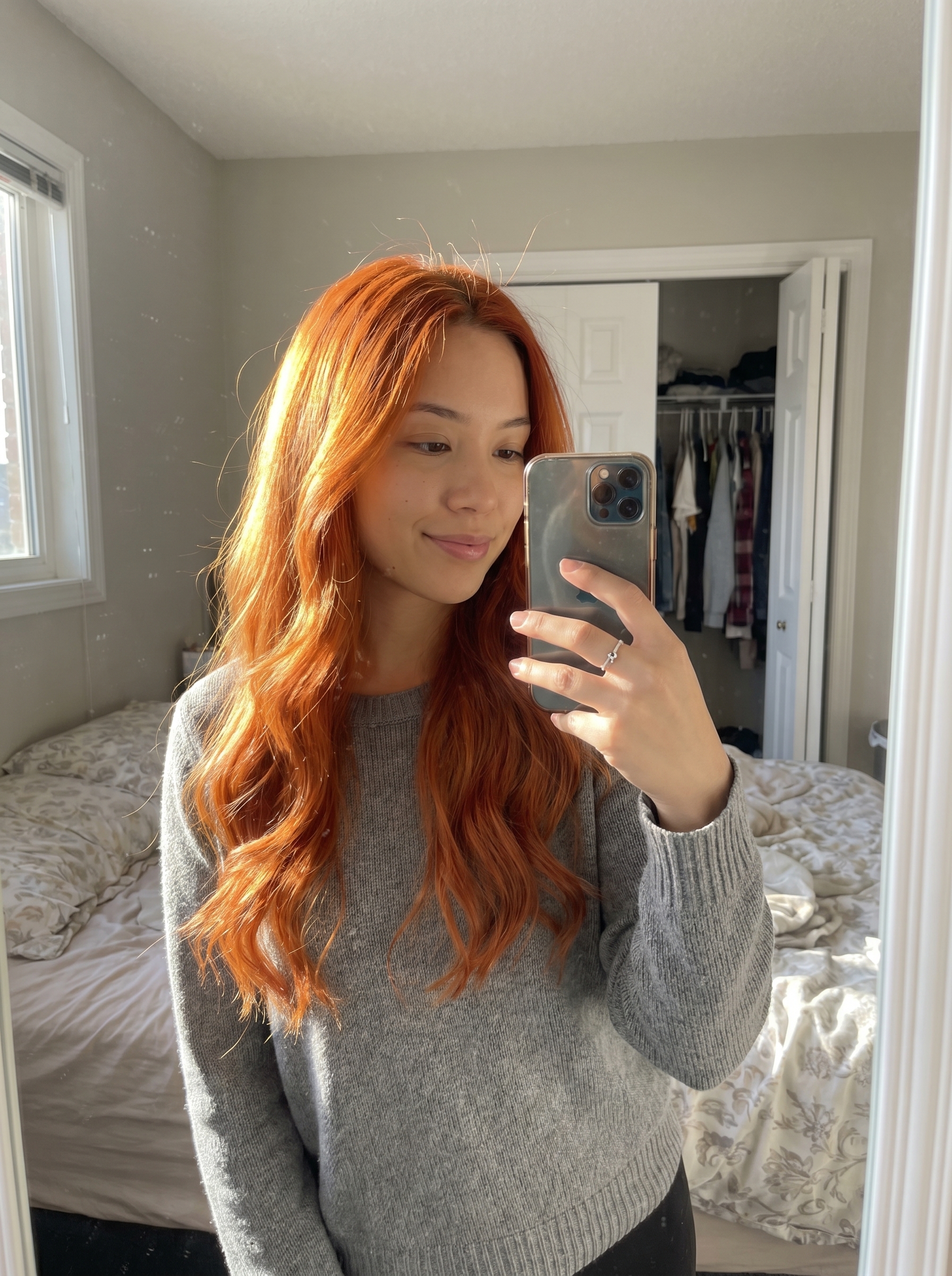 Effortless Aperol Spritz Waves: Summer Red Hair Looks 2026 Vibrant 'Aperol Spritz Waves' with a diffuser for summer red hair looks 2026. This casual, translucent orange-red wavy style is ideal for vacations or beach days.