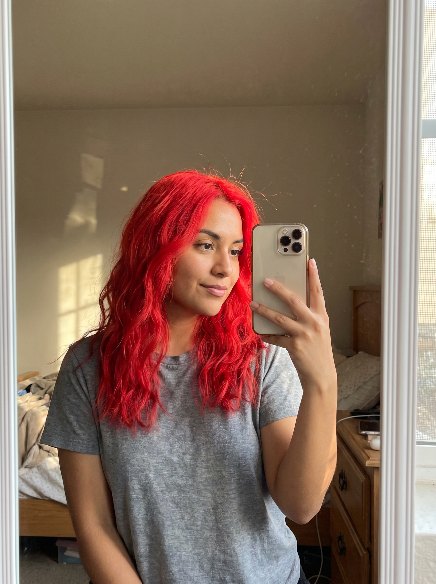 Neon Red Accents & Air-Dry Texture | Summer Red Hair Looks 2026 Playful techno-nature neon red hair accents with air-dry texture for summer red hair looks 2026. Features organic texture and a large, colorful claw clip for a rebellious festival or casual outing style.