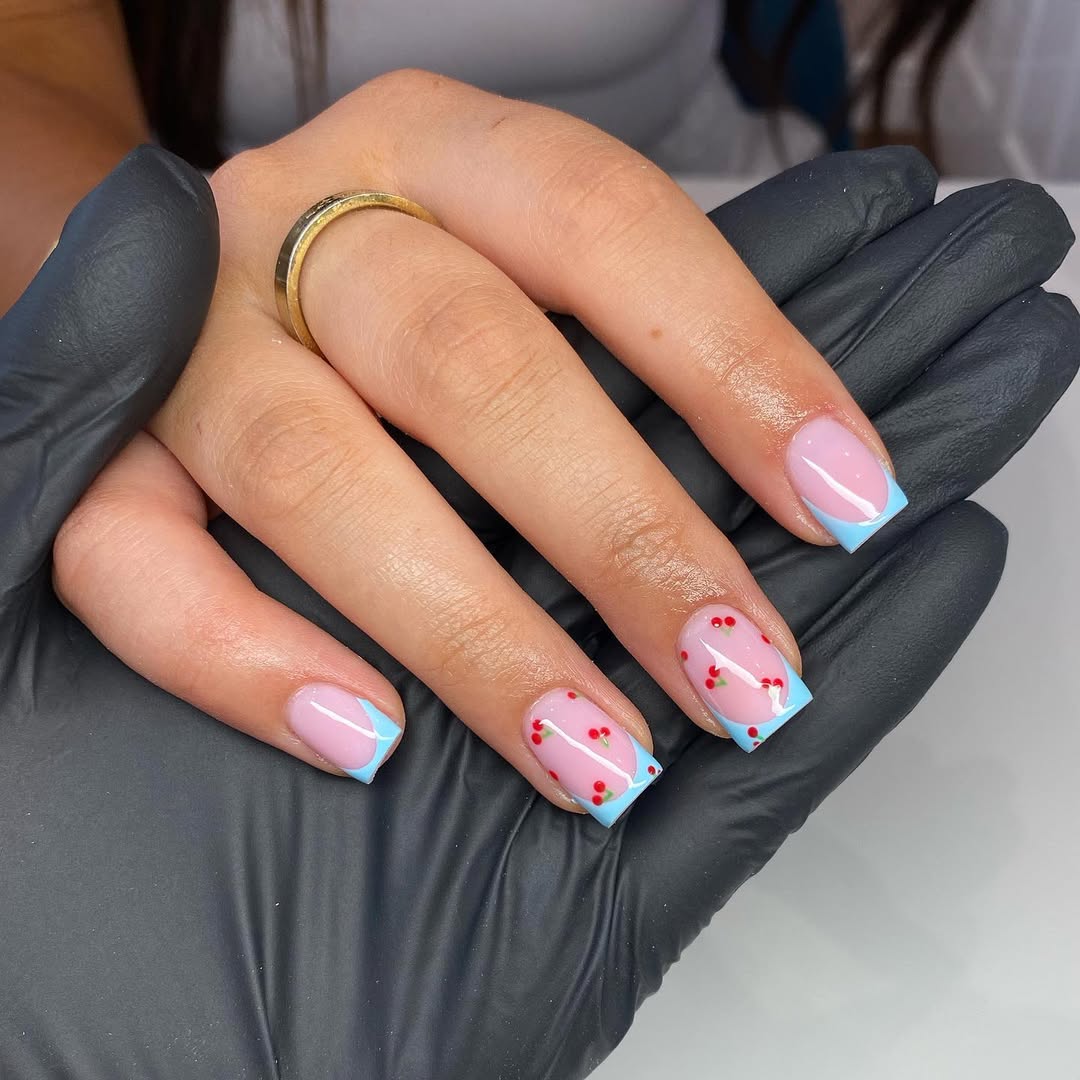 Baby Blue French Tips With Playful Cherry Accent Nails