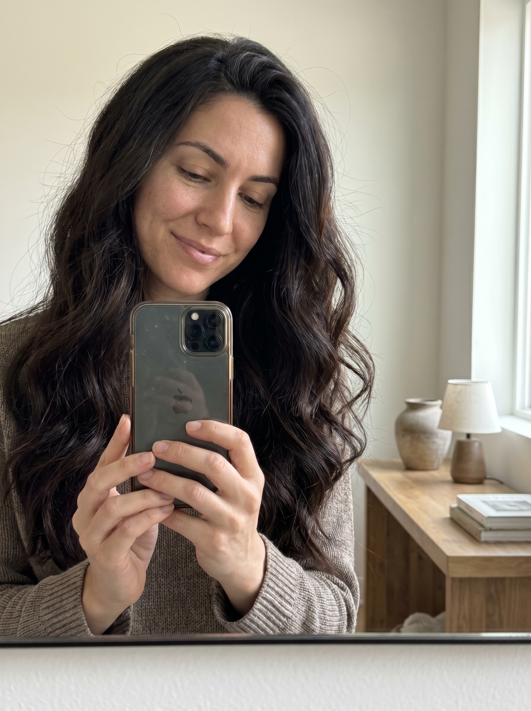 Mediterranean Chic Beach Waves Hair Summer 2026 Sophisticated voluminous beach waves hair summer 2026 for a date night, featuring deep brunette hair styled with a rose gold large barrel curling iron for an elegant, glossy finish.