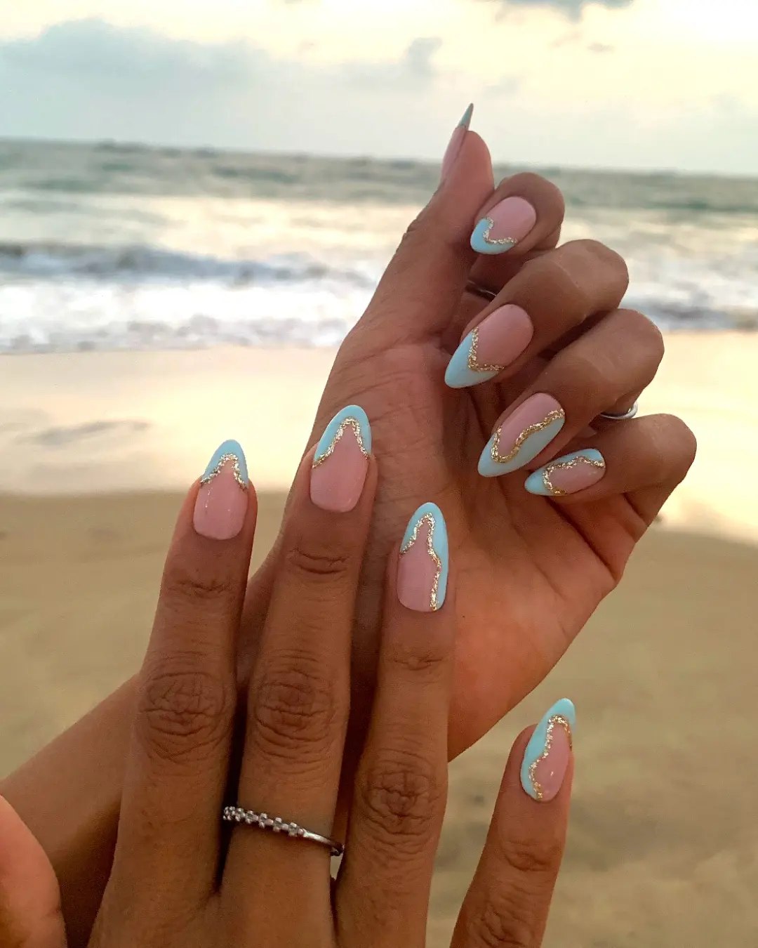 Blue and Gold Wavy French Tip Almond Nails