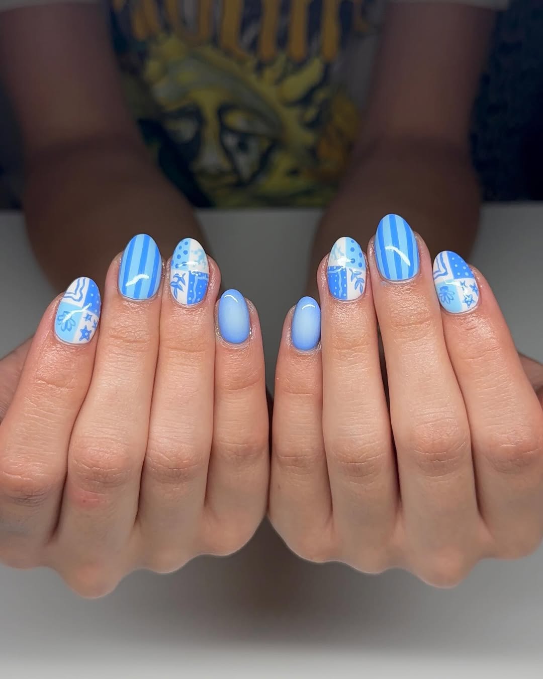 Blue and White Patterned Ombre Nail Art