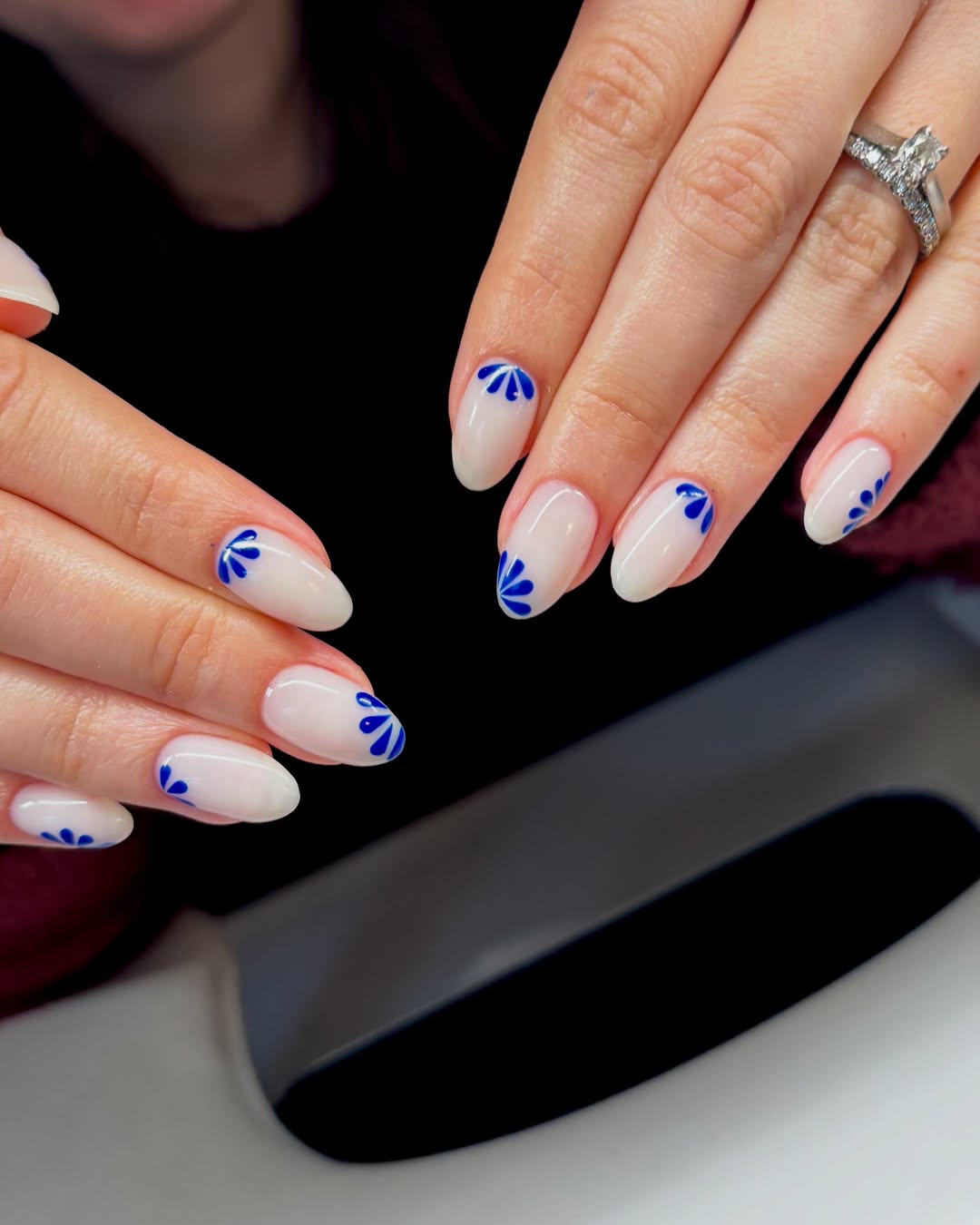 Blue Bloom White Glossy Almond Nails