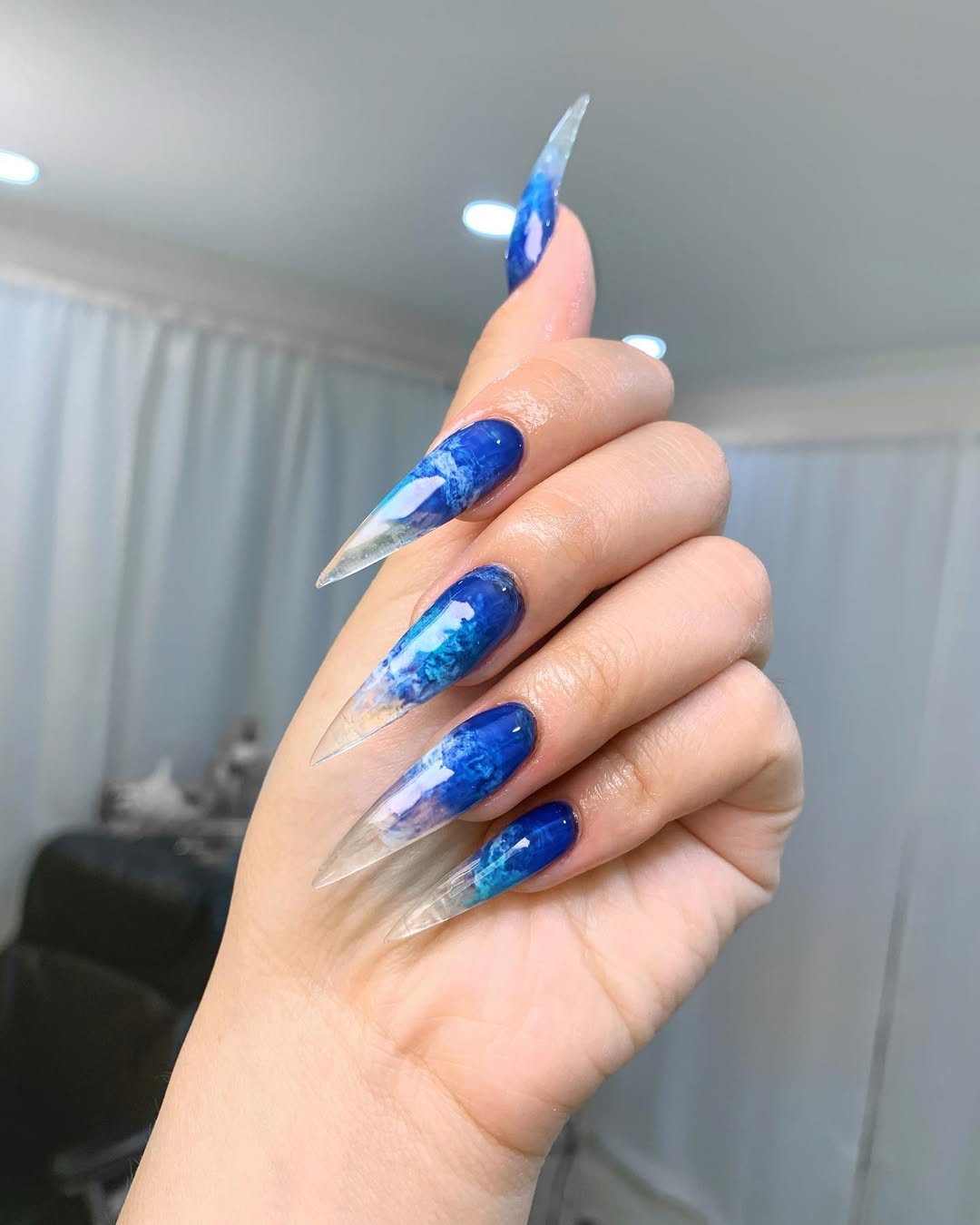 Blue Ocean Wave Clear Stiletto Nails