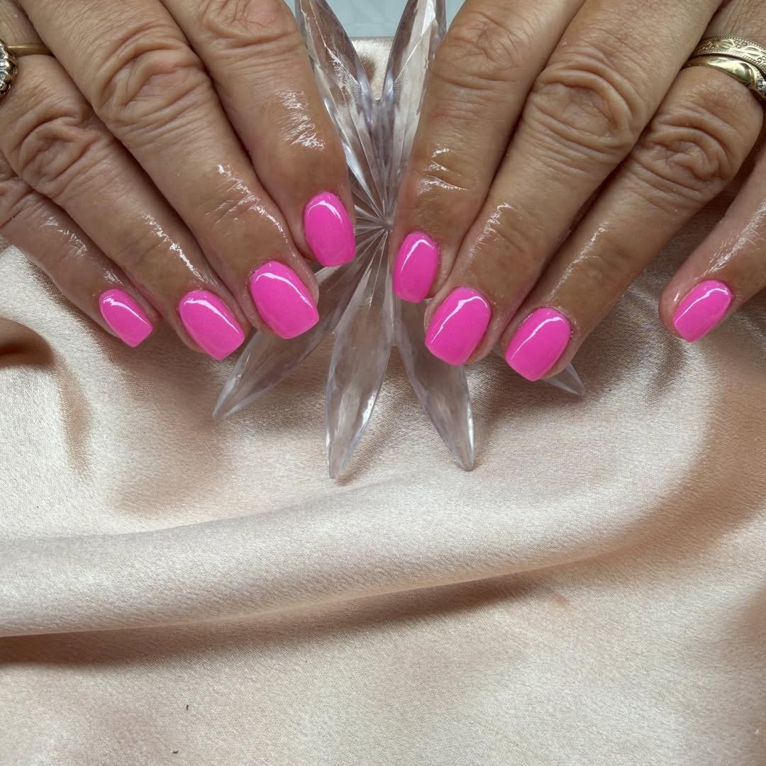 Bright Glossy Hot Pink Short Oval Nails