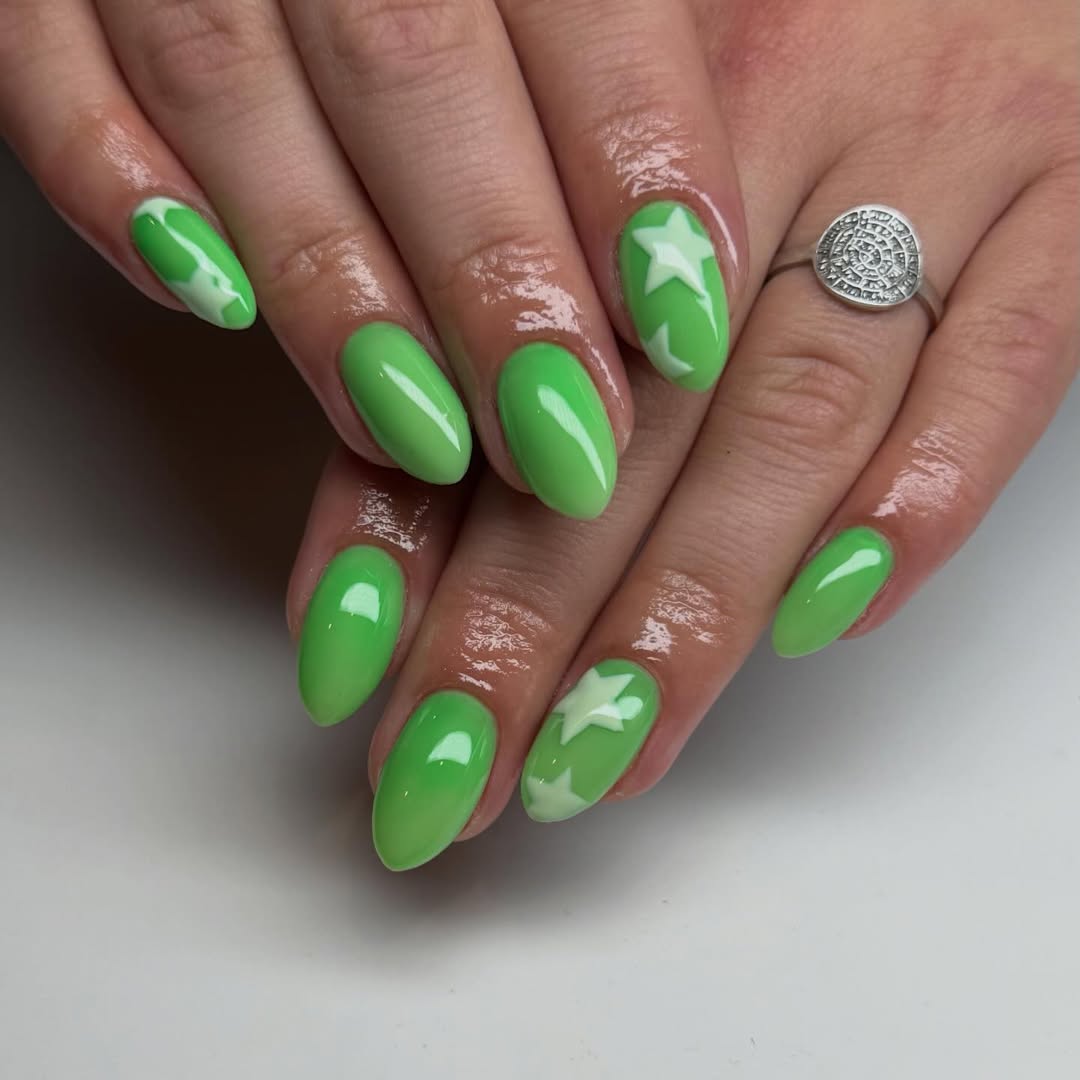 Bright Green Glossy Nails With White Star Art