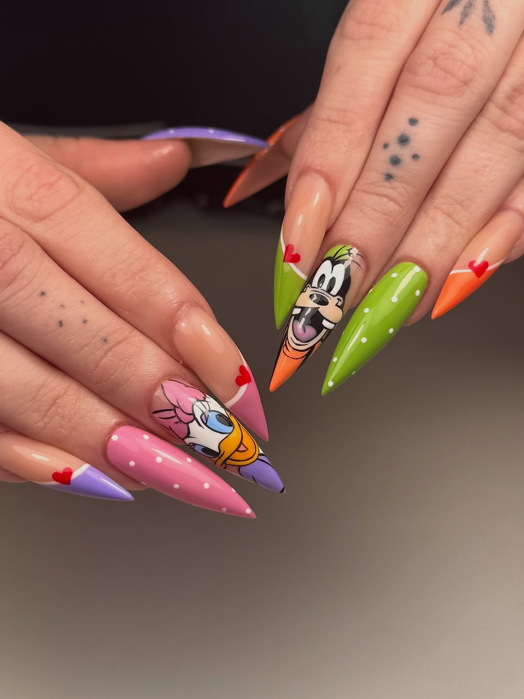 Cartoon Fun Mismatched Stiletto Nails