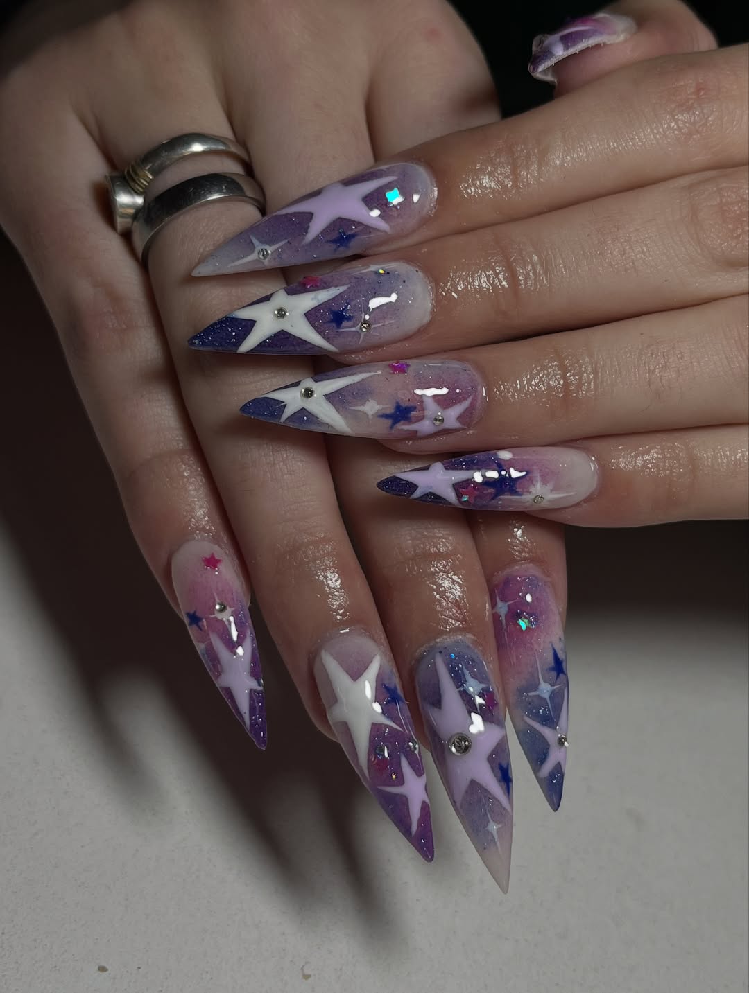 Celestial Starlight Ombré Stiletto Nails with Rhinestones