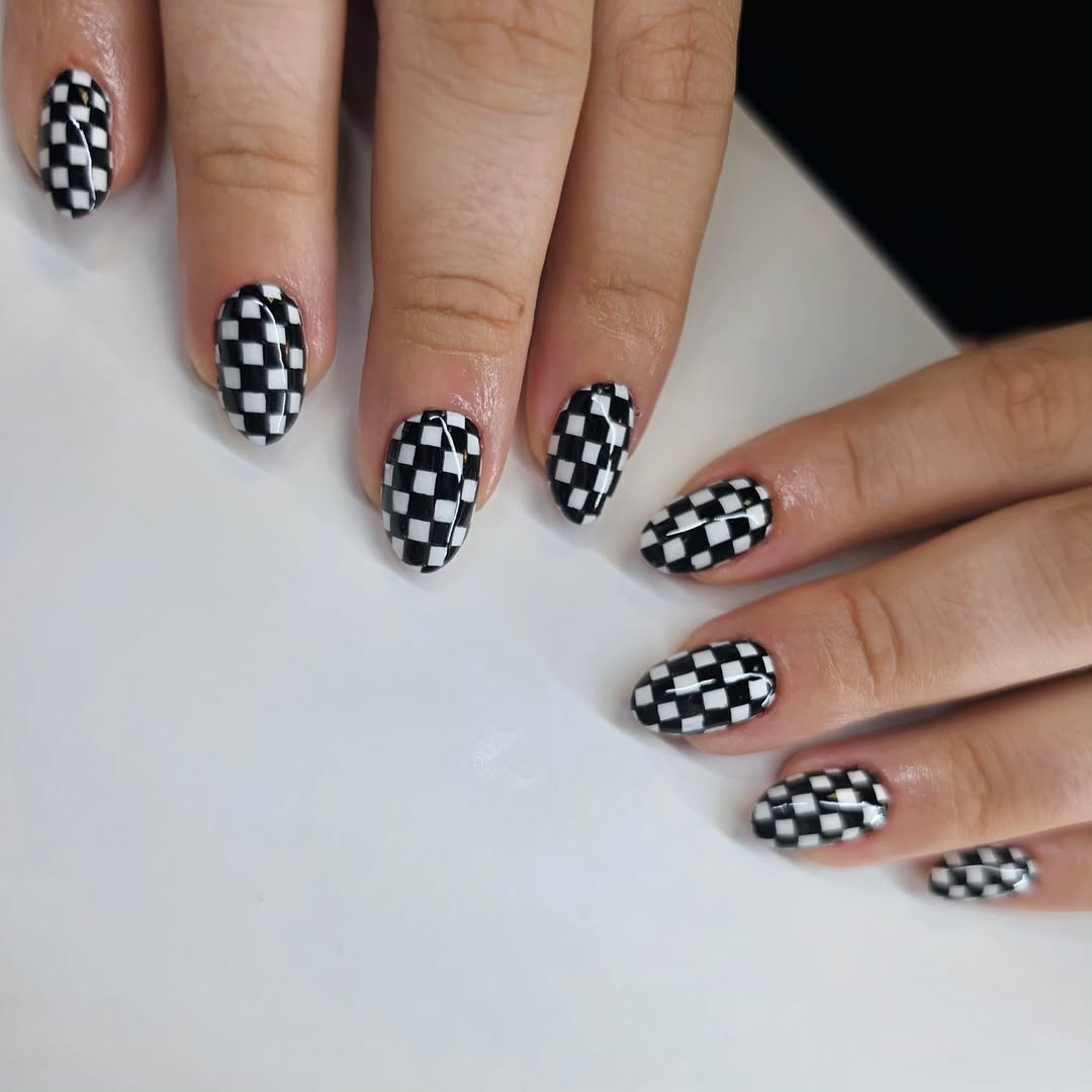 Cool Black and White Checkerboard Almond Nails