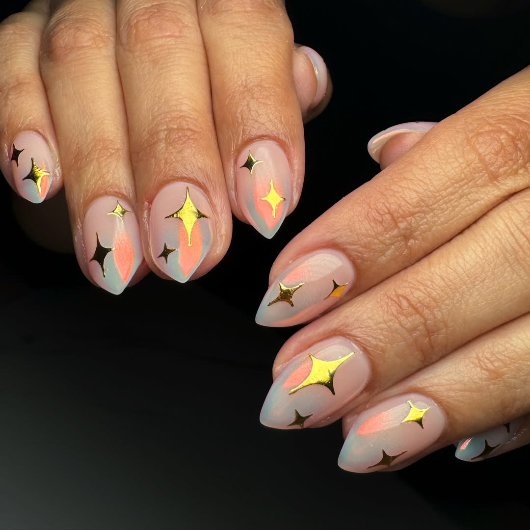 Dreamy Aura Gold Star Stiletto Nails