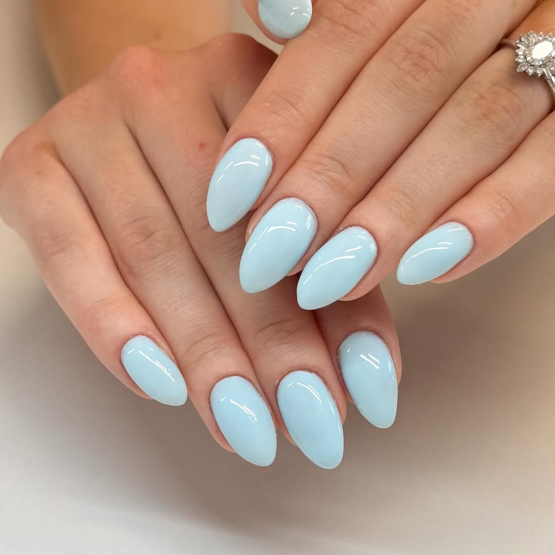 Glossy Baby Blue Almond Nails