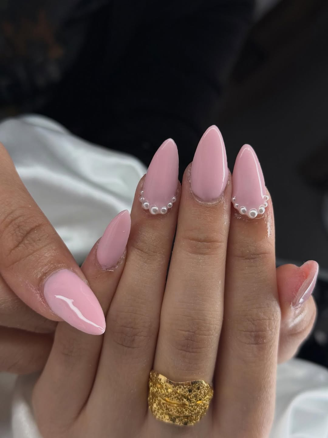 Glossy Bubblegum Pink Almond Nails with Pearl Cuticle Detail