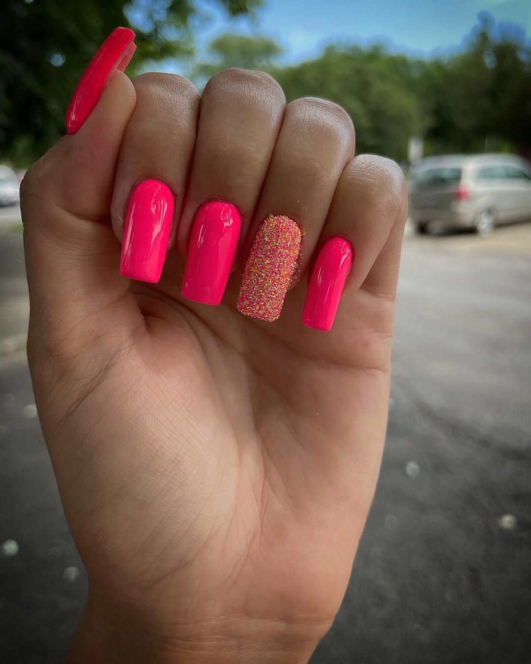 Hot Pink Glossy Coffin Nails with Glitter Accent