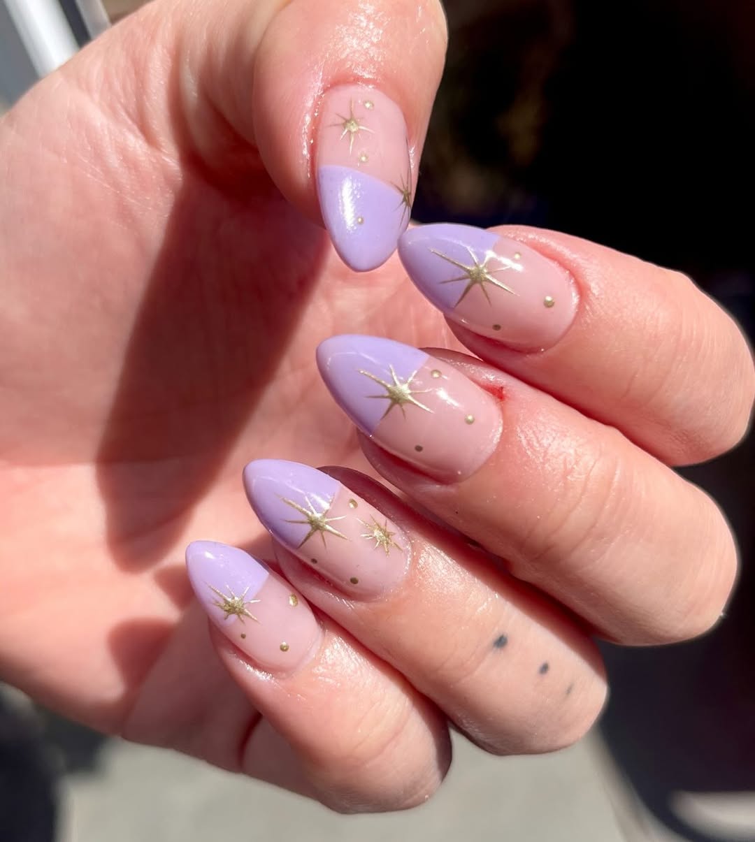 Lavender Crescent Nails with Gold Starbursts and Dots