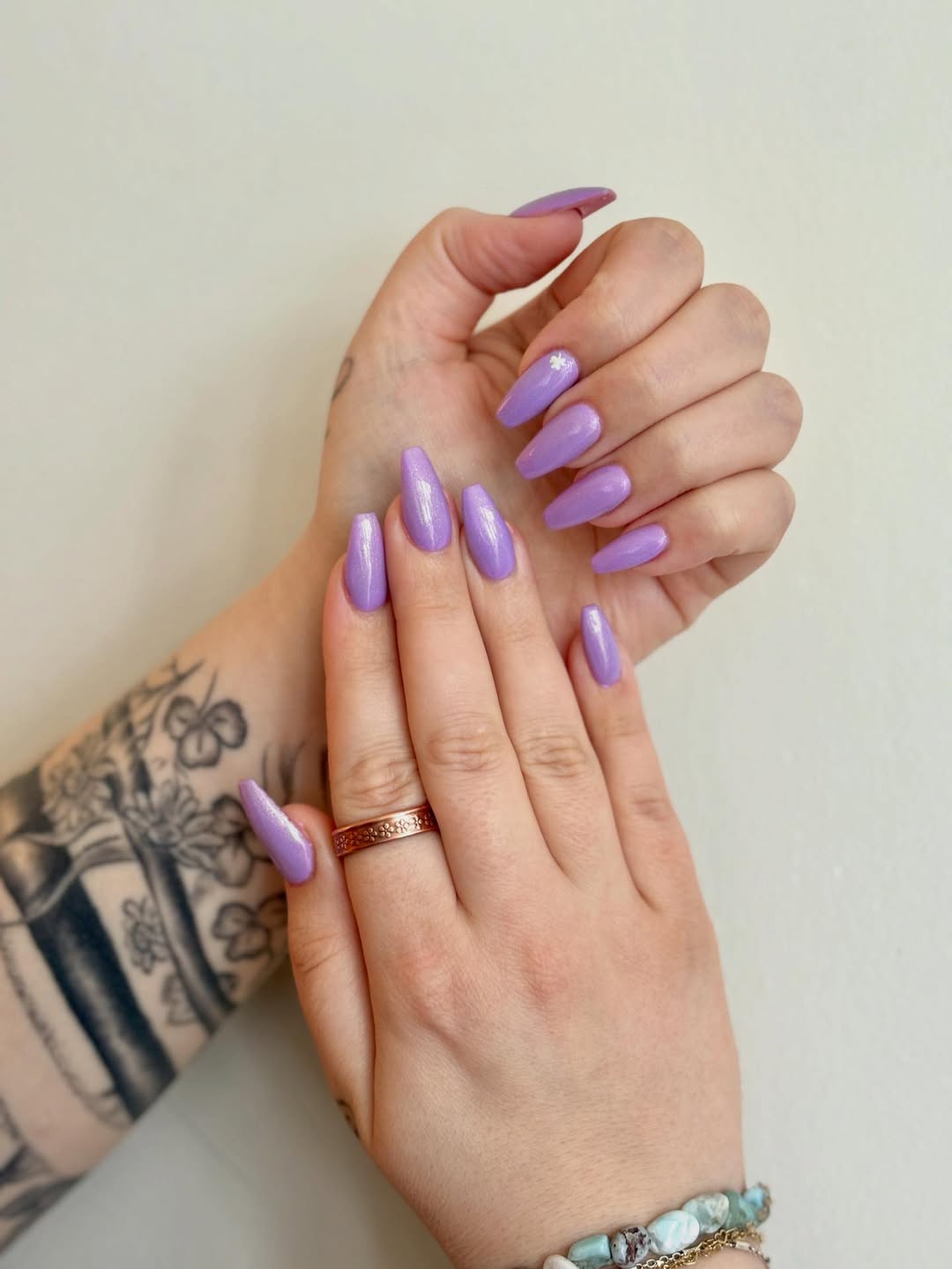 Lavender Shimmer Coffin Nails with Rhinestone Accent