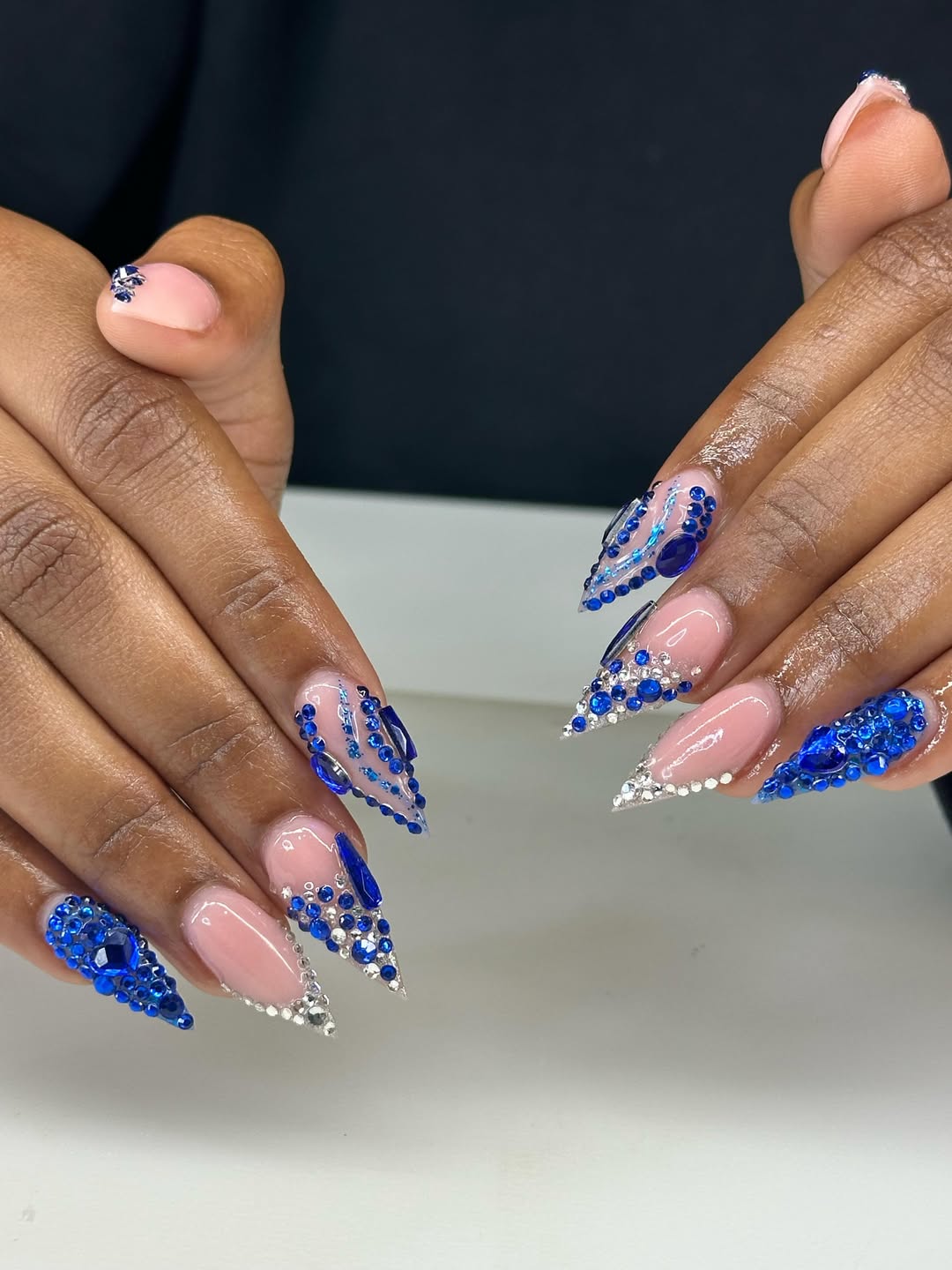 Luxurious Blue and Clear Rhinestone Stiletto Nails