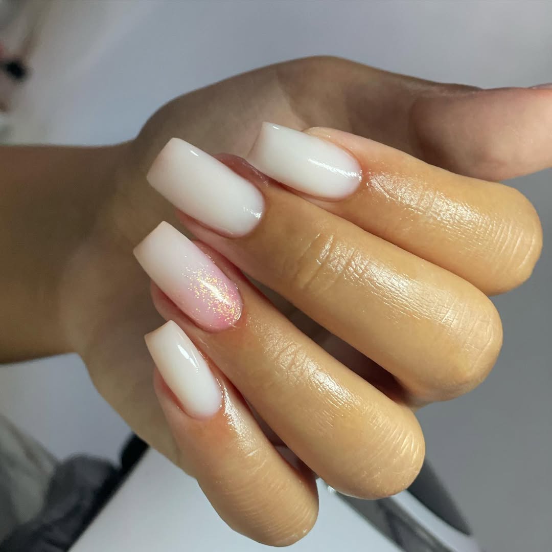 Milky Pink Ombré Coffin Nails with Glitter Accent