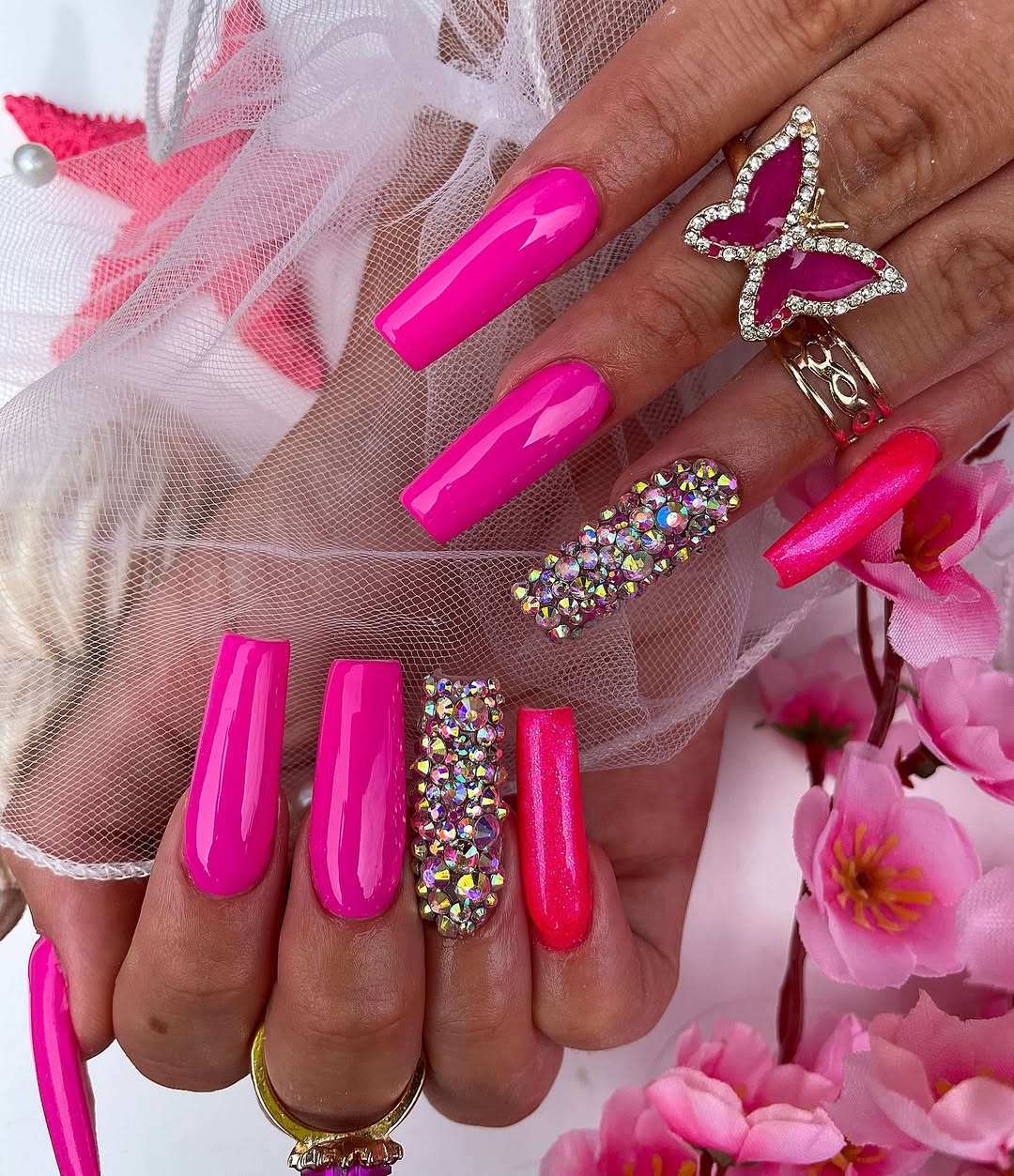 Neon Pink Coffin Nails with Bling Accent
