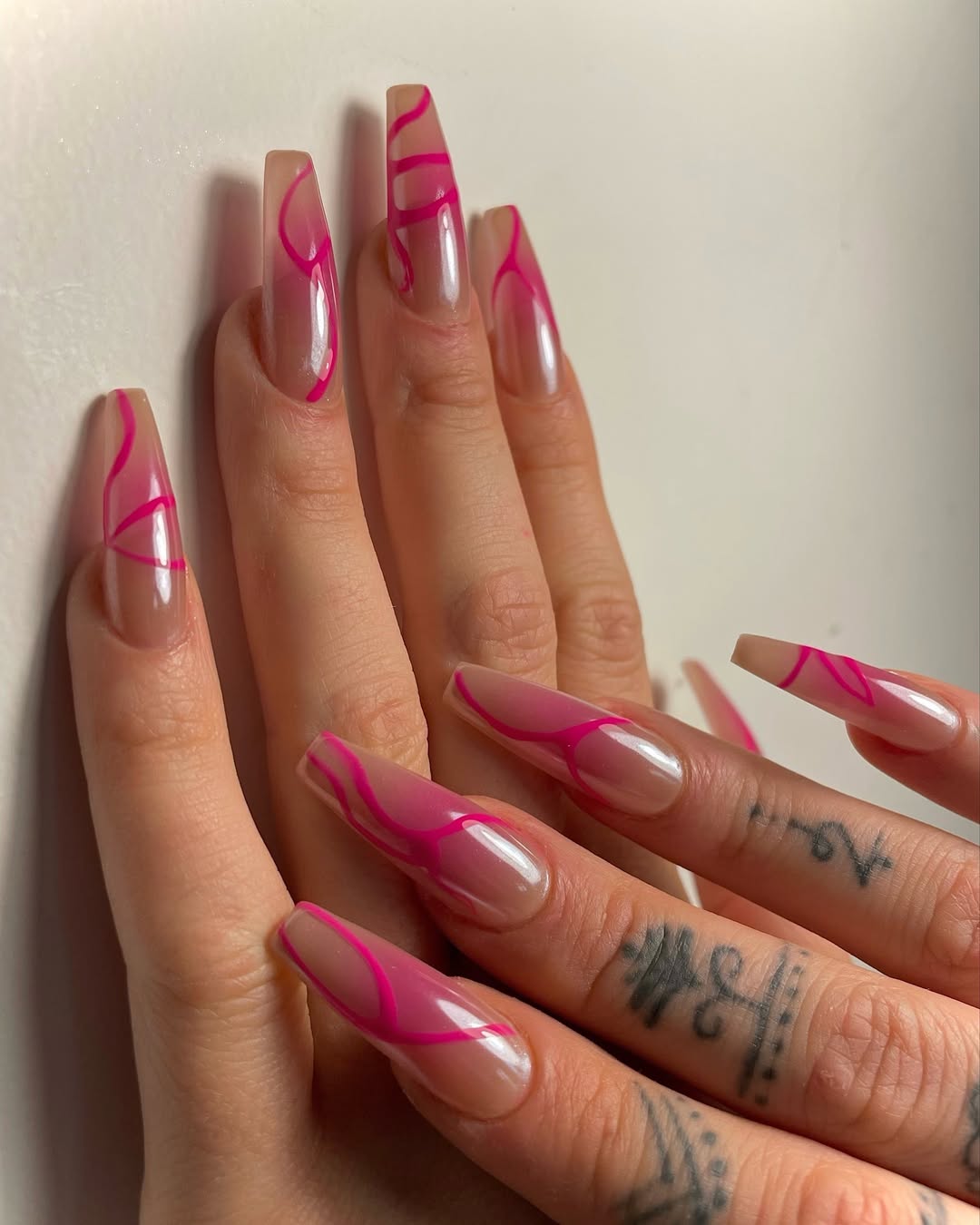 Neon Pink Swirls Glossy Nude Coffin Nails