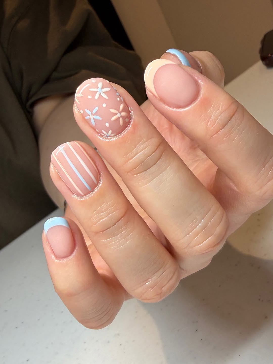 Pastel French Tips and Delicate Floral Art Nails