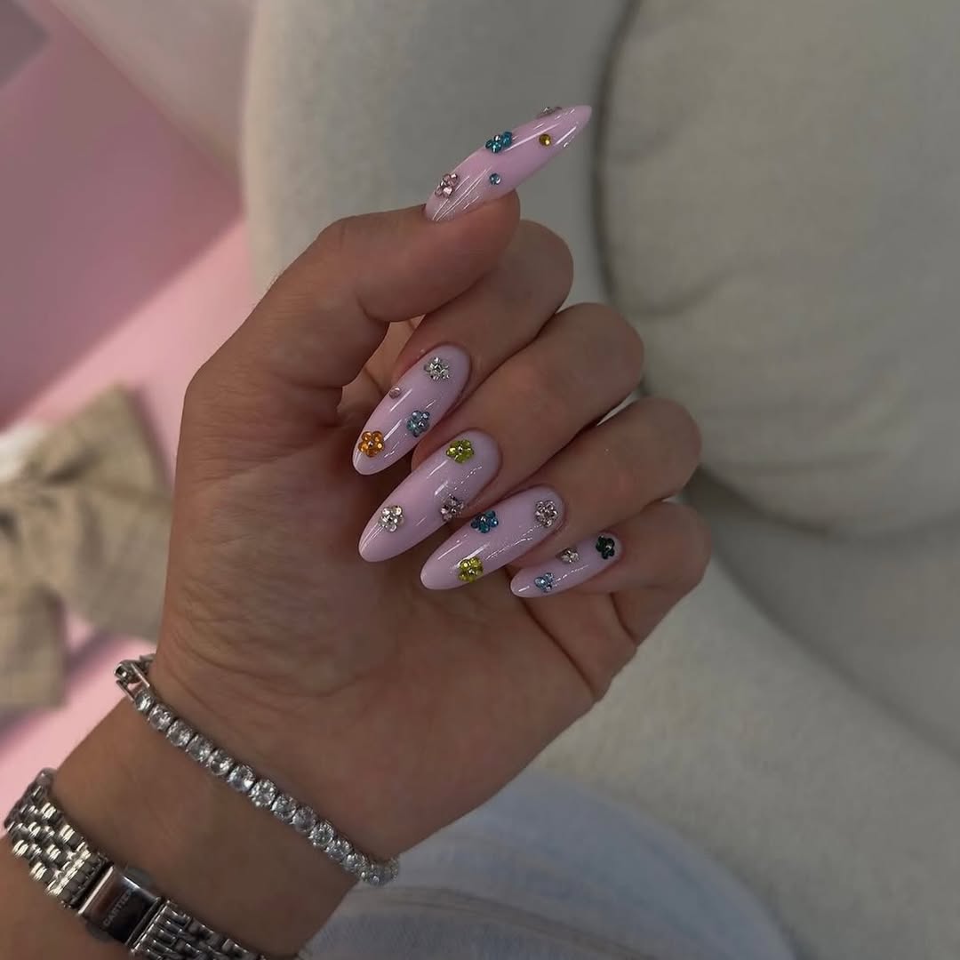 Pastel Pink Almond Nails with Colorful Floral Rhinestone Gems