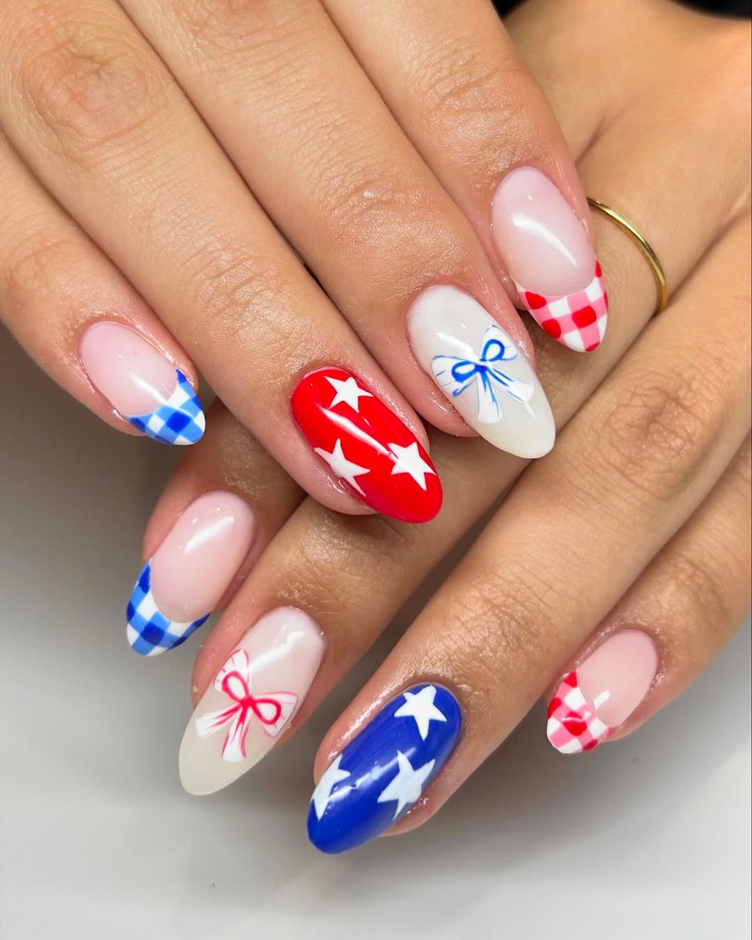 24 Red White Blue Nails You Need for 2026 4 Patriotic Gingham and Stars Almond Nails with Bows