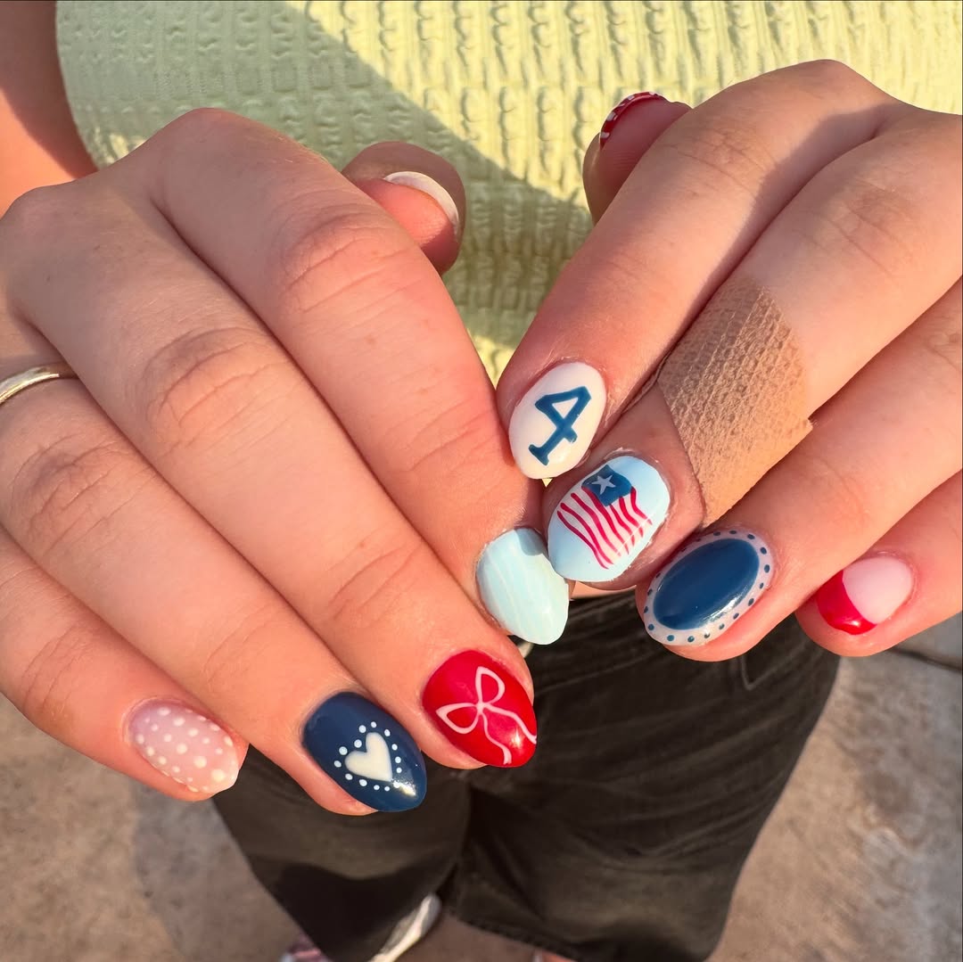 25 Patriotic Nail Ideas for 2026 You’ll Love 13 Patriotic Red White Blue Almond Art