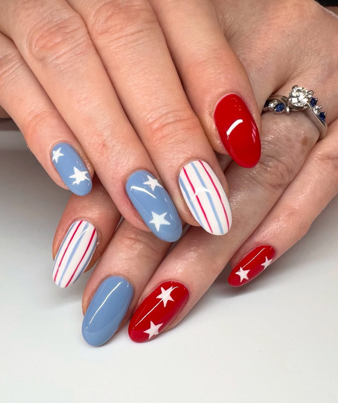 25 Patriotic Nail Ideas for 2026 You’ll Love 11 Patriotic Red White Blue Stars And Stripes Almond Nails