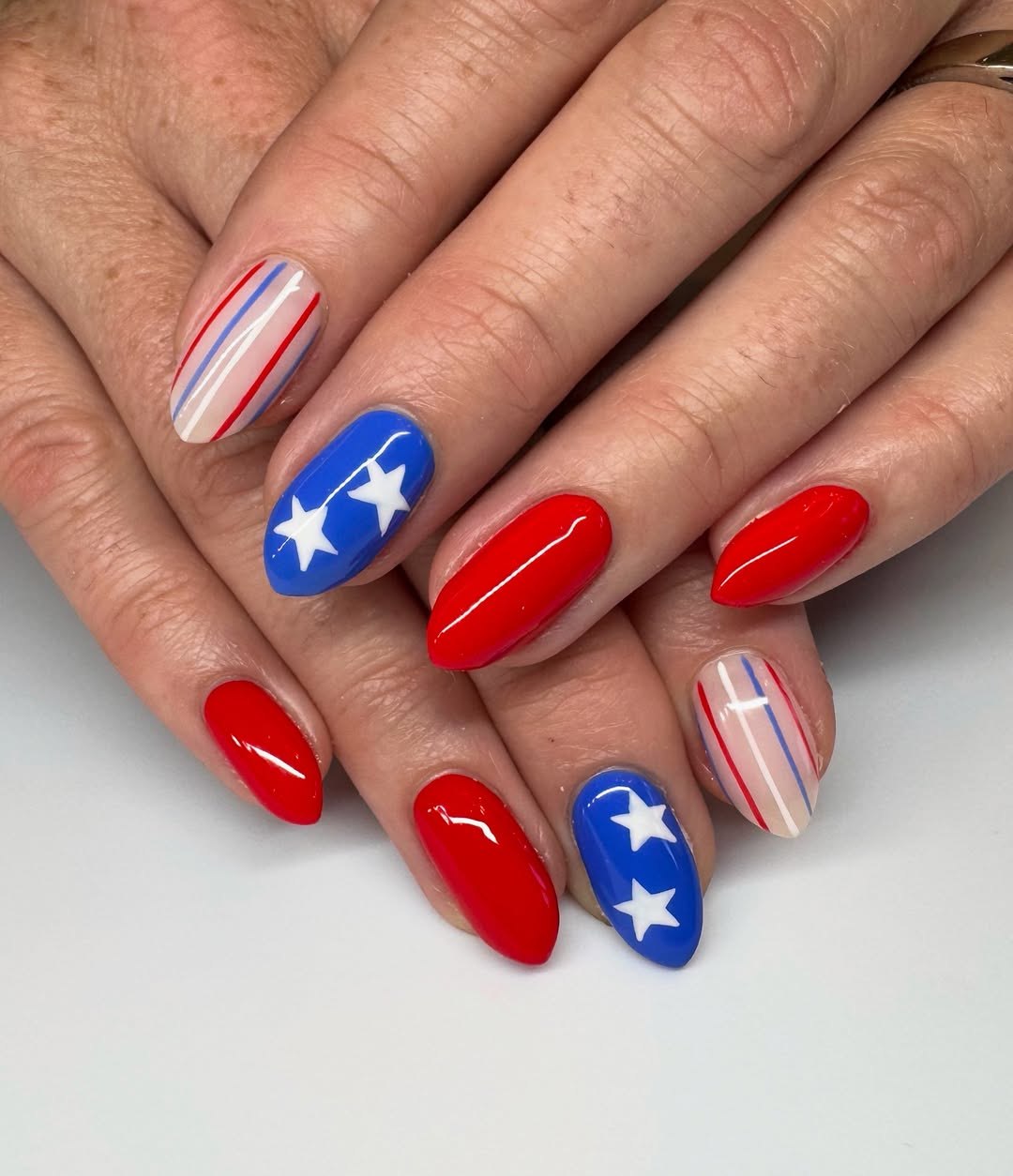 25 Patriotic Nail Ideas for 2026 You’ll Love 9 Patriotic Red White Blue Stars And Stripes Nails