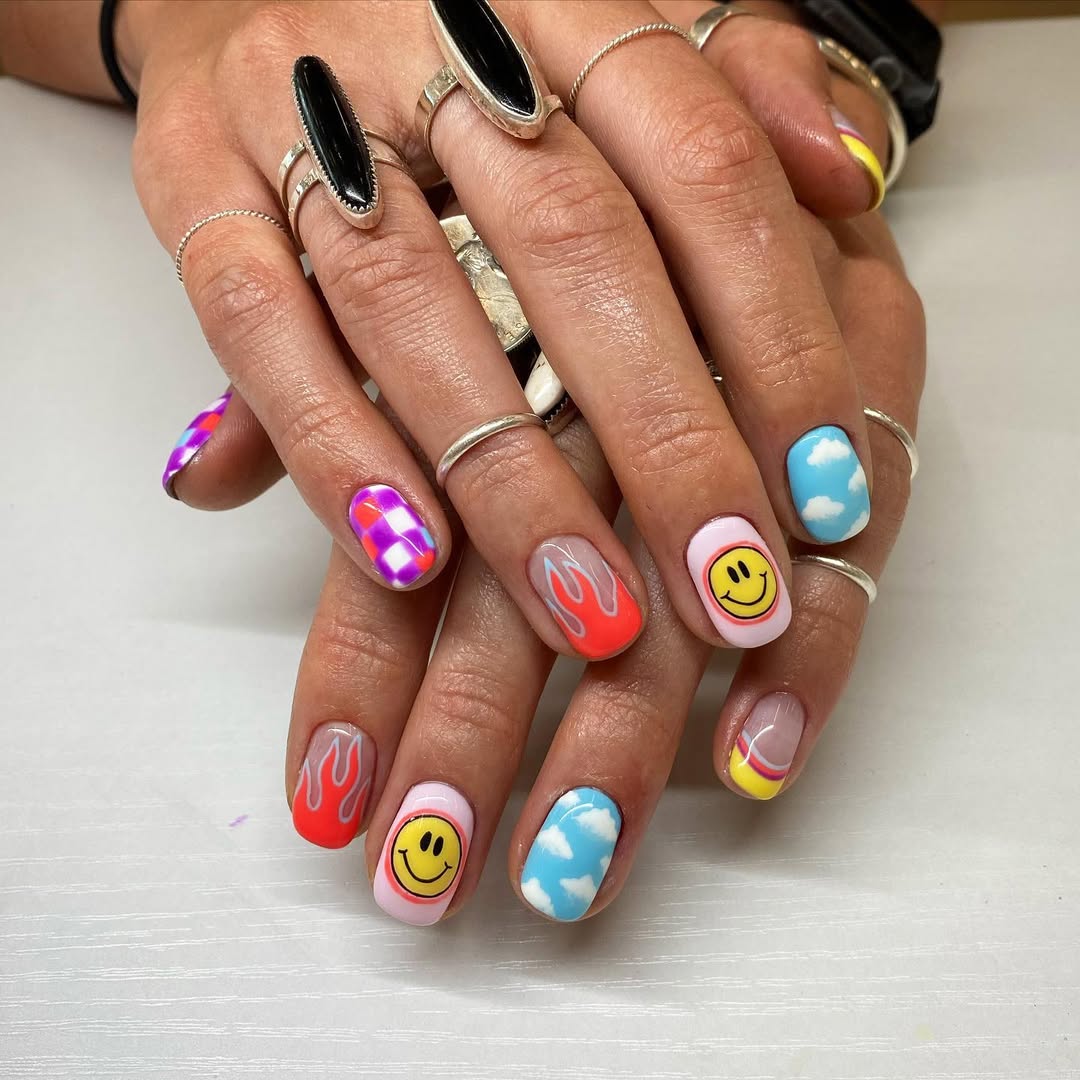 Playful Mismatched Smiley Face Flame Cloud Nails