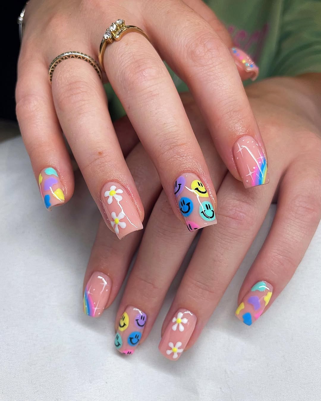 Playful Pastel Smiley Daisy Squoval Nails