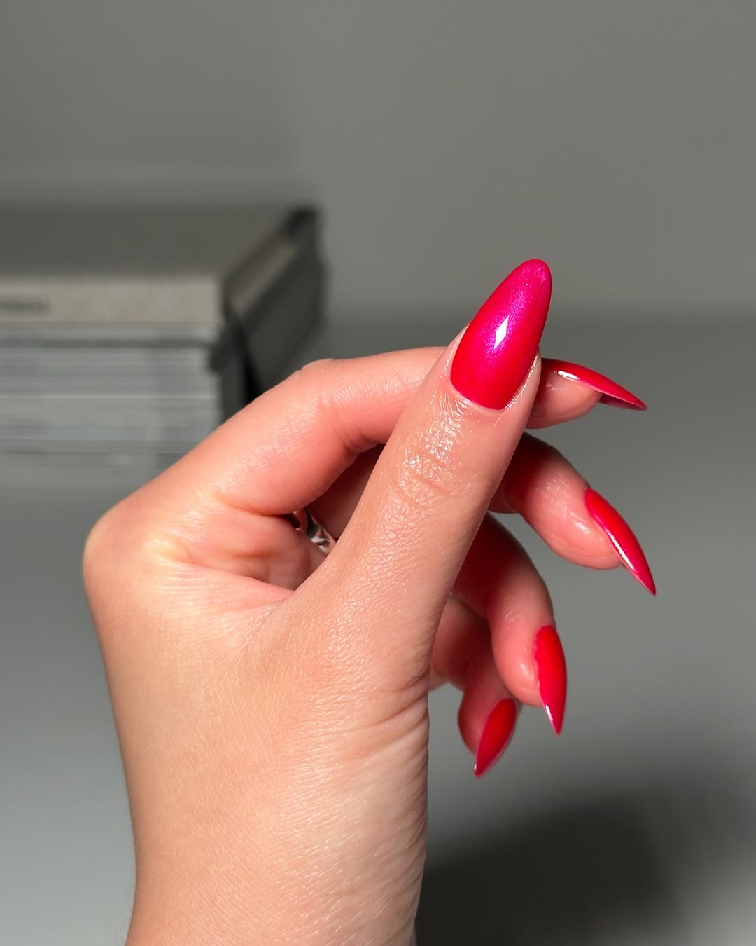 Shimmering Cherry Red Stiletto Nails