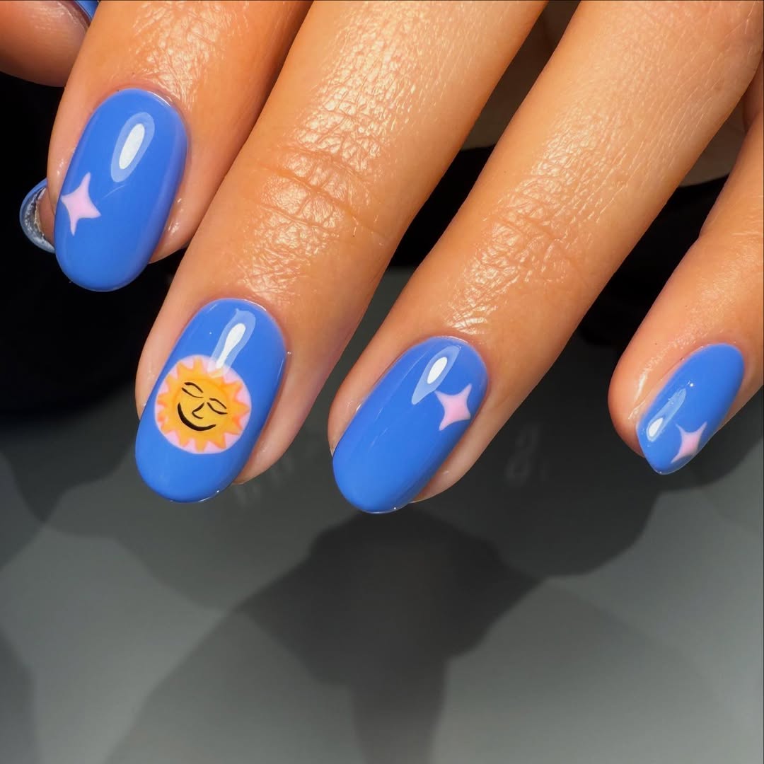 Sky Blue Smiling Sun and Star Short Oval Nails