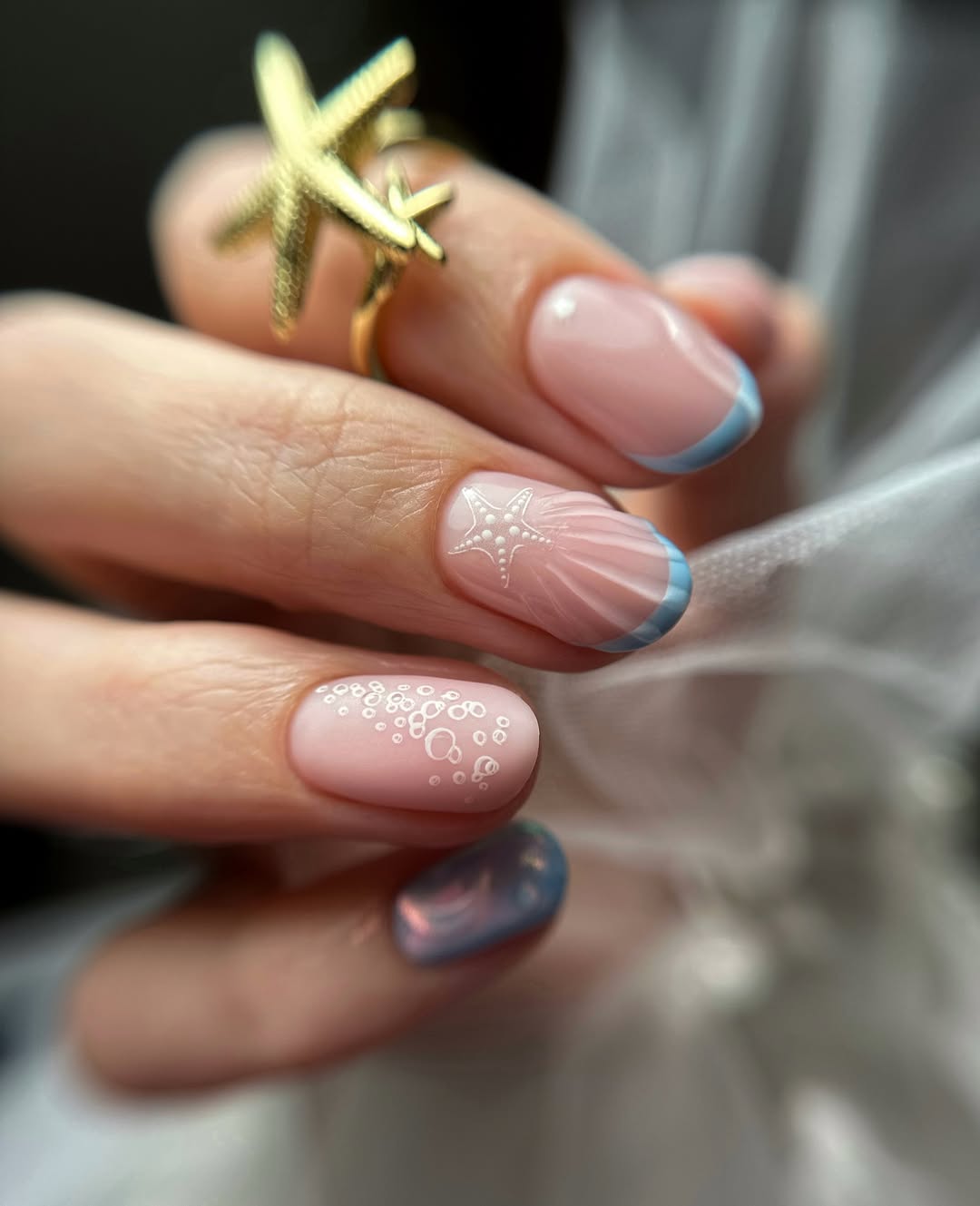 Soft Blue French Tips with Under-the-Sea Nail Art