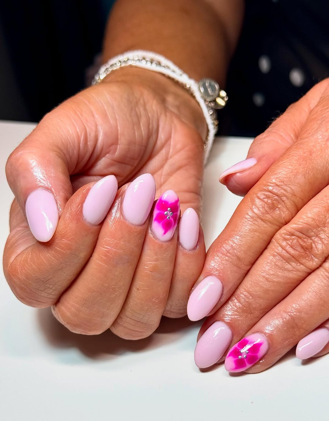 Soft Pink Flower Accent Almond Nails