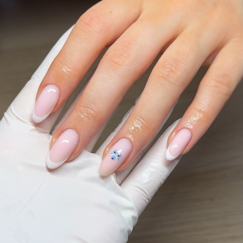 Soft Pink French Tips with Delicate Flower Art