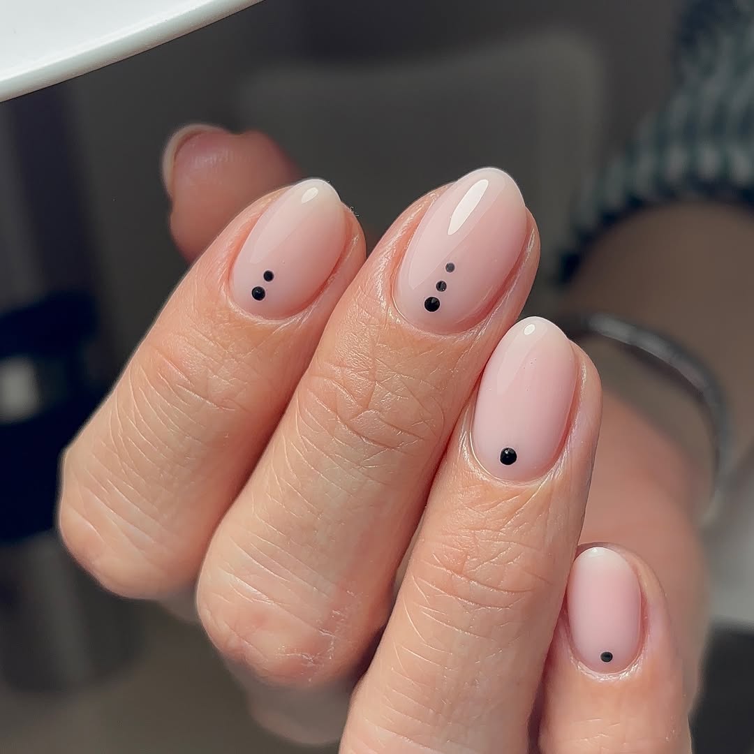 Soft Pink Gel Nails with Minimalist Black Dots