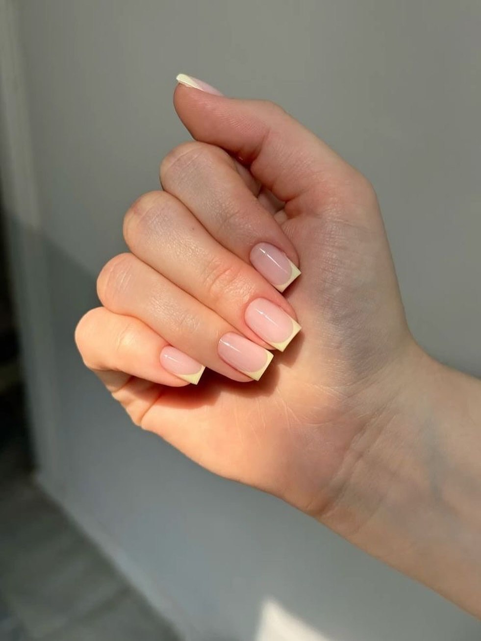 Soft Yellow French Tip Short Square Nails