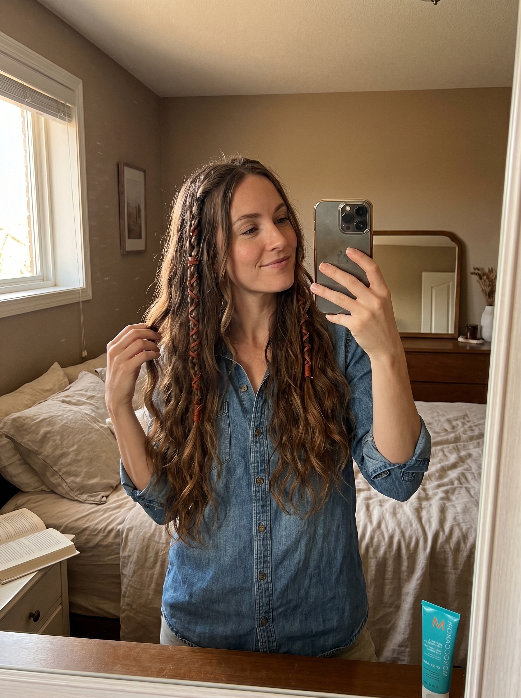 Boho Coastal Cowgirl braids with natural hair colors and earthy-toned leather wraps, a relaxed option for summer cute hair ideas 2026. This effortless look uses styling cream and sea salt spray, great for festivals or everyday.