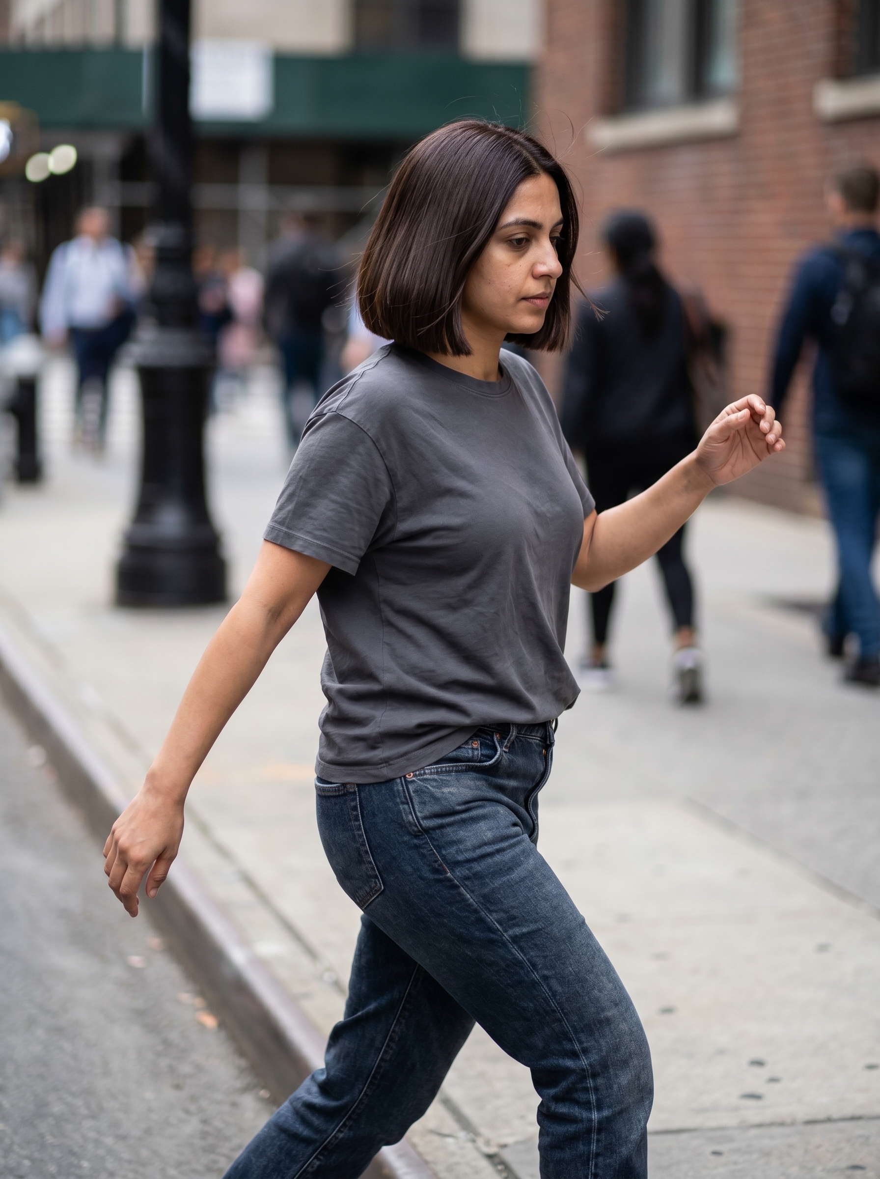 Sleek 'Hydro-Bob' hairstyle with a rich Midnight Espresso Gloss, a chic and modern look for summer cute hair ideas 2026. This 'wet-look' style uses high-shine gel and a boar bristle brush, perfect for day-to-night wear.