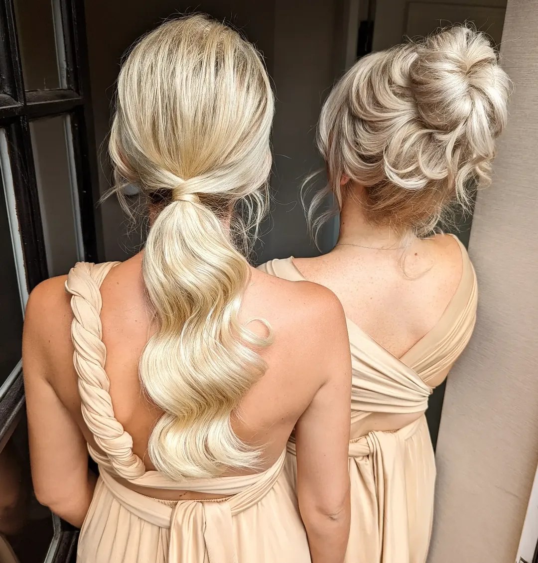 Close-up of a woman with long, sun-kissed blonde hair styled in soft waves and a subtle side part, perfect for summer cute hair ideas 2026.