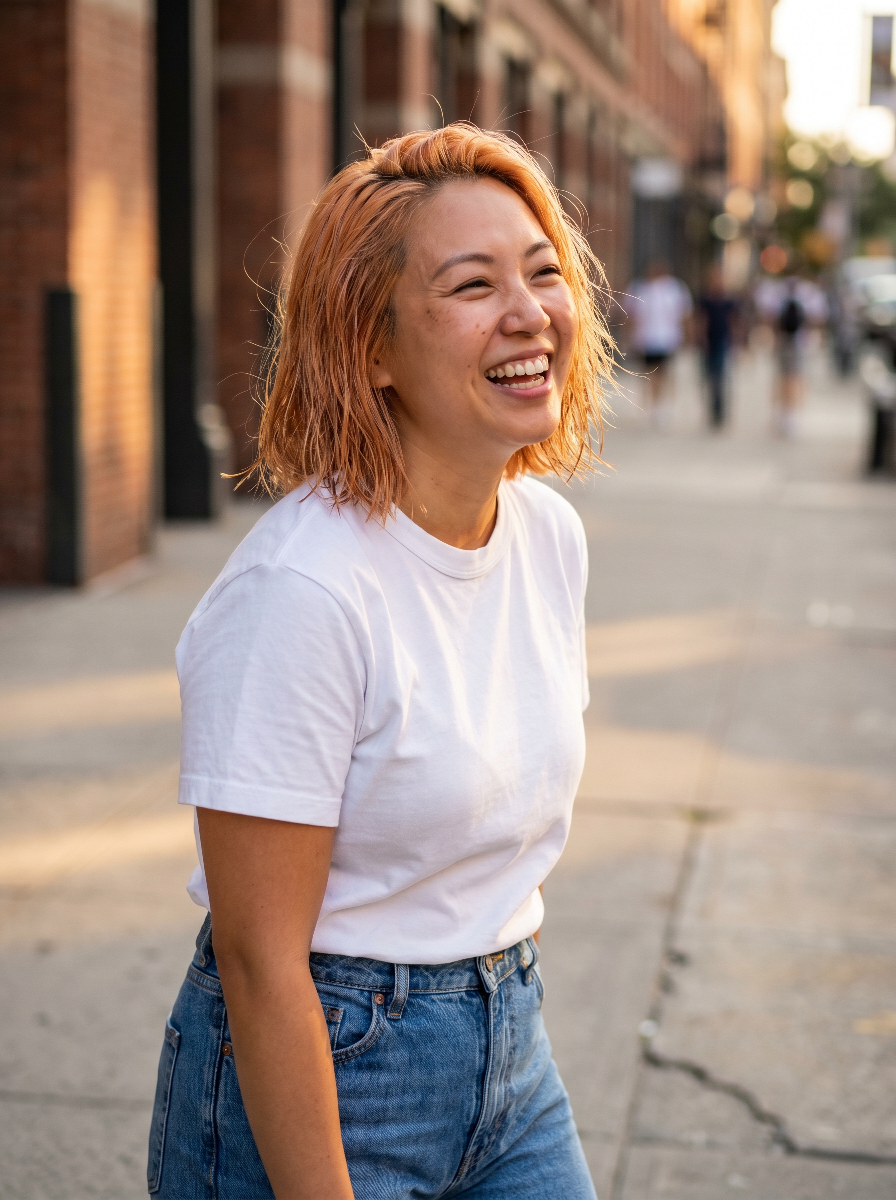 A bold and playful Apricot Crush Hydro-Bob, a trendsetting style with vibrant apricot orange and pink tones for summer hair cute colors 2026, ideal for festivals or date nights.