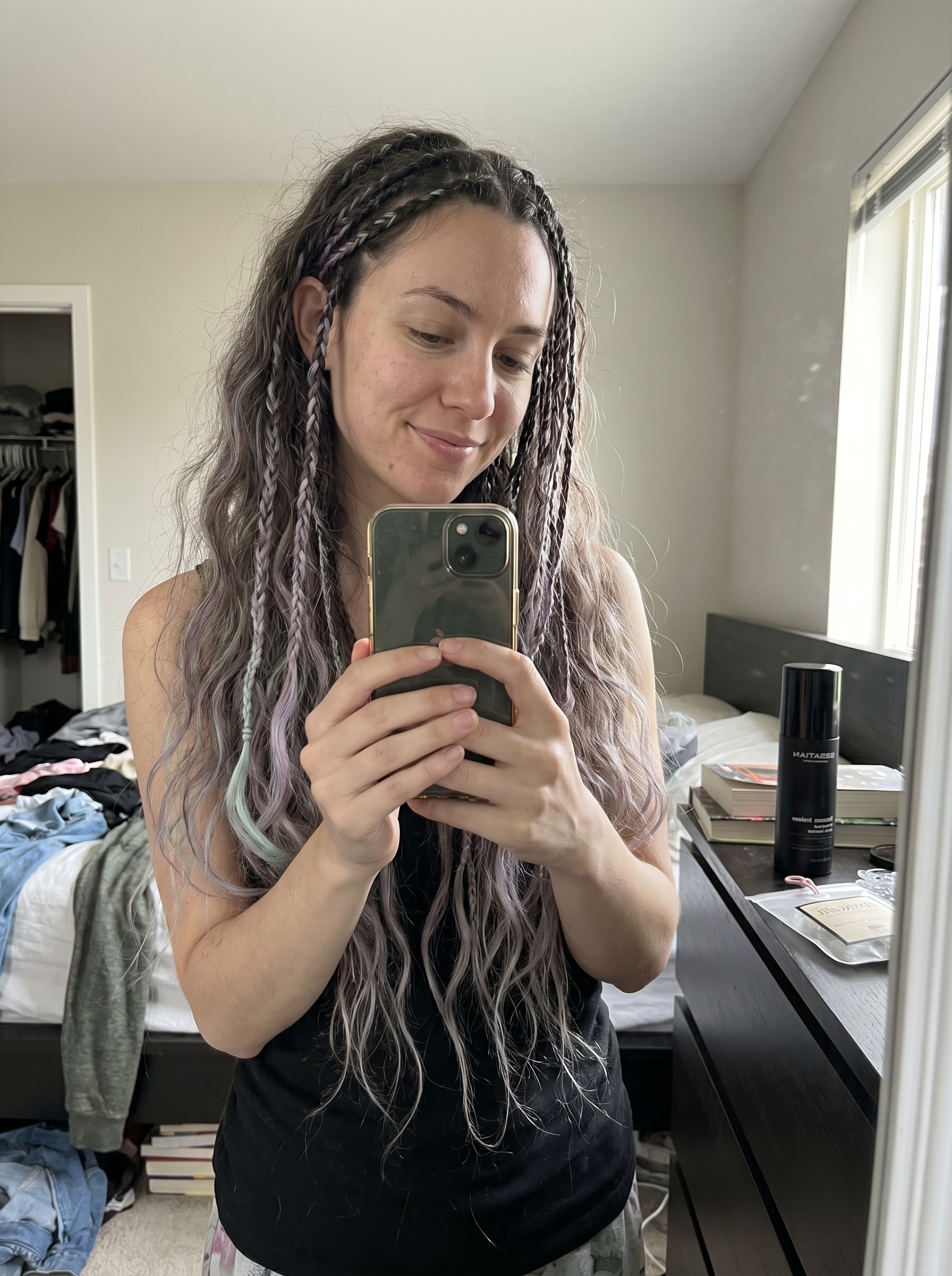 Ethereal Grunge Tiny Braids: Teen Hairstyles Summer 2026 Romantic and edgy Ethereal Grunge Tiny Braids, a top teen hairstyles summer 2026 trend, featuring natural hair with faded pastel chalk or spray and a messy matte texture.
