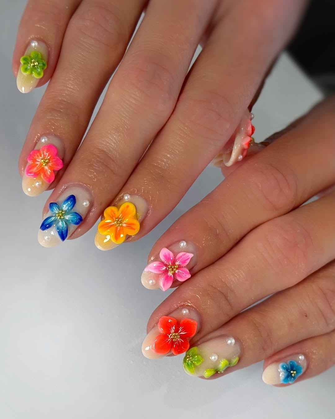 Vibrant 3D Pastel Floral Nude Oval Nails