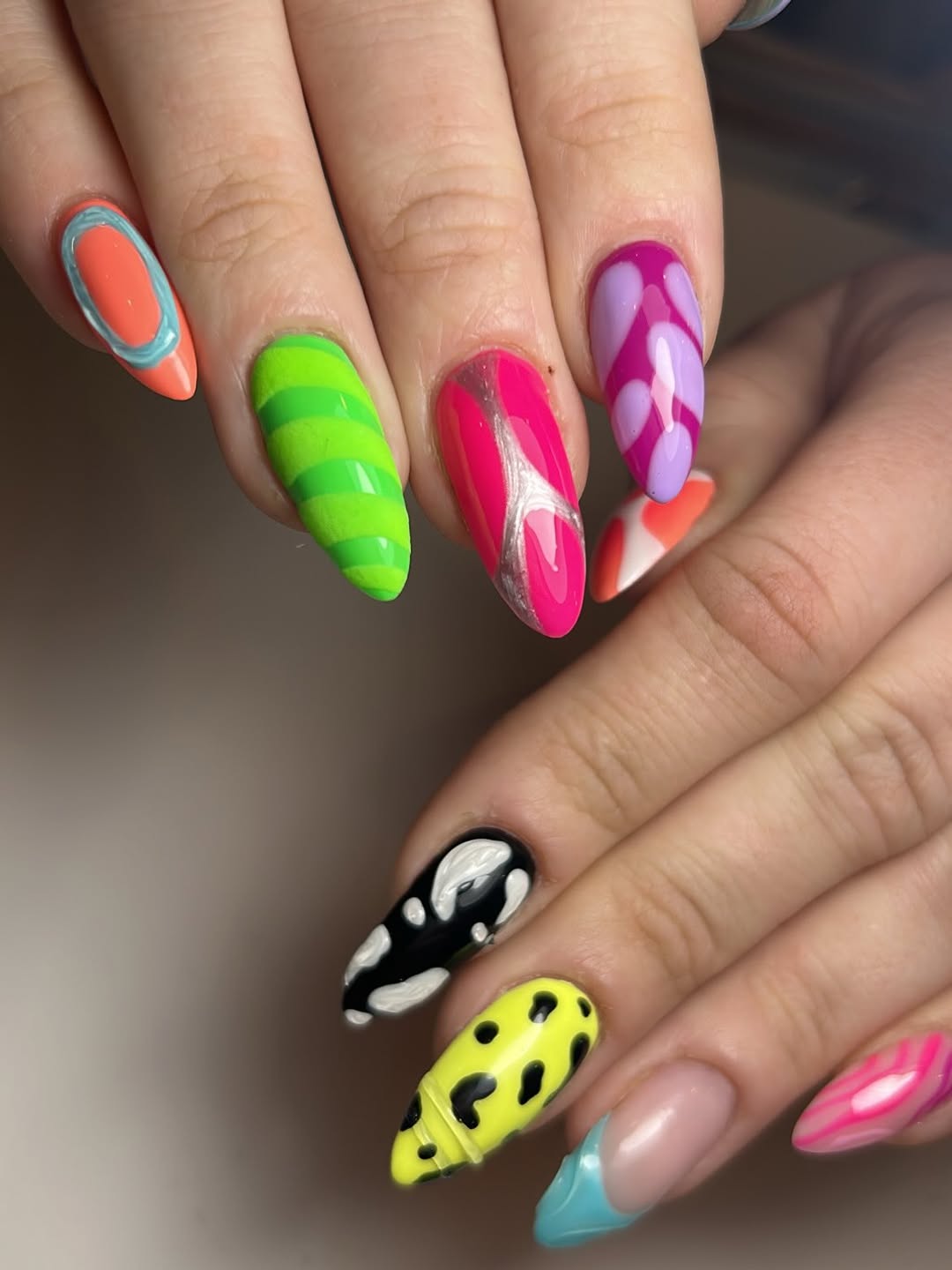 Vibrant Abstract Almond Nails with Funky Patterns