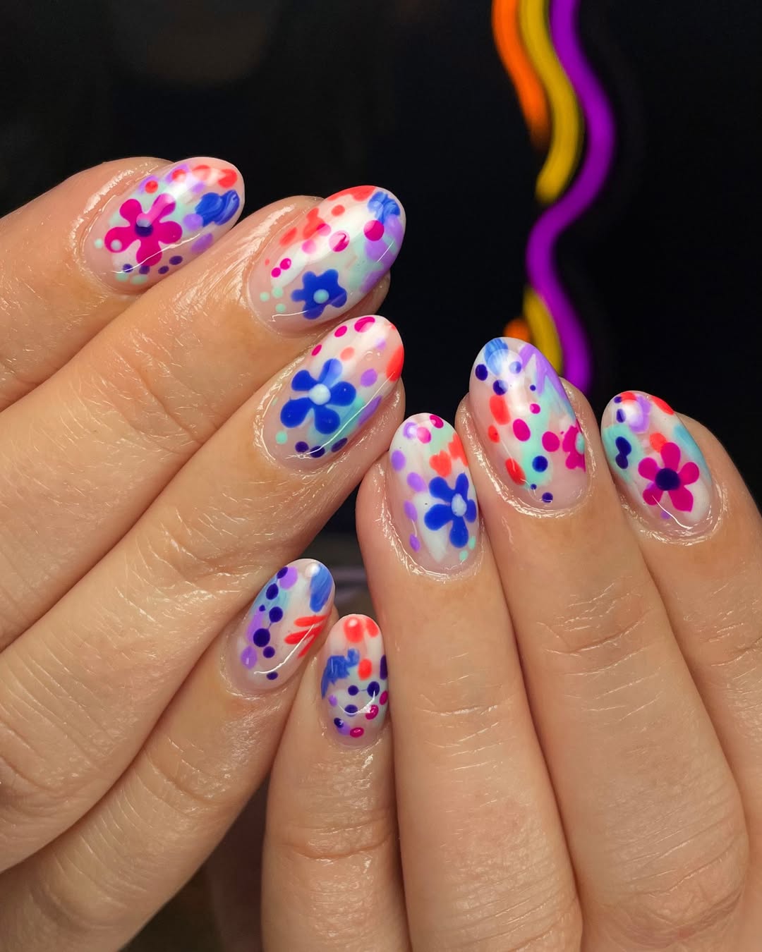 Vibrant Abstract Floral Nail Art with Glossy Finish