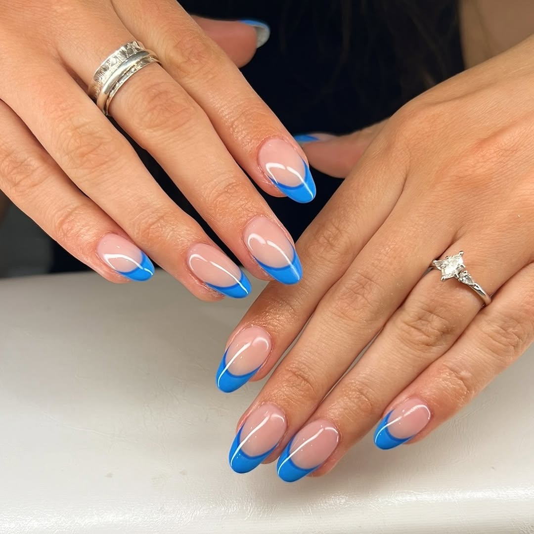Vibrant Blue Oval French Tip Nails