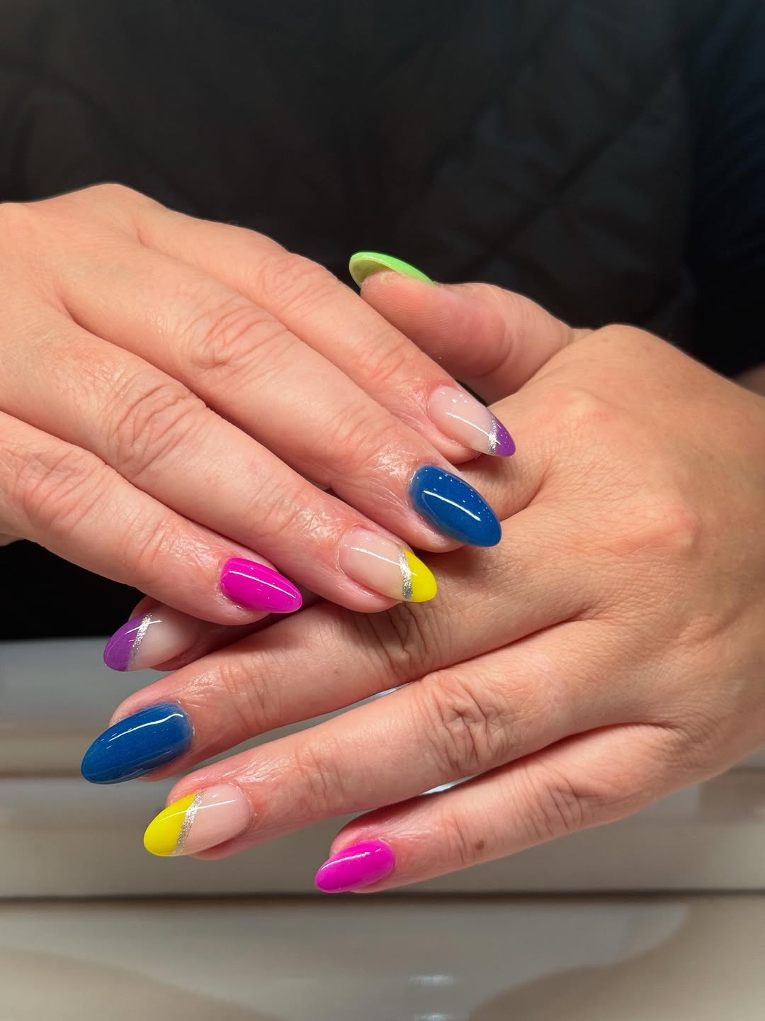 Vibrant Color Block Almond Nails with Silver Accent